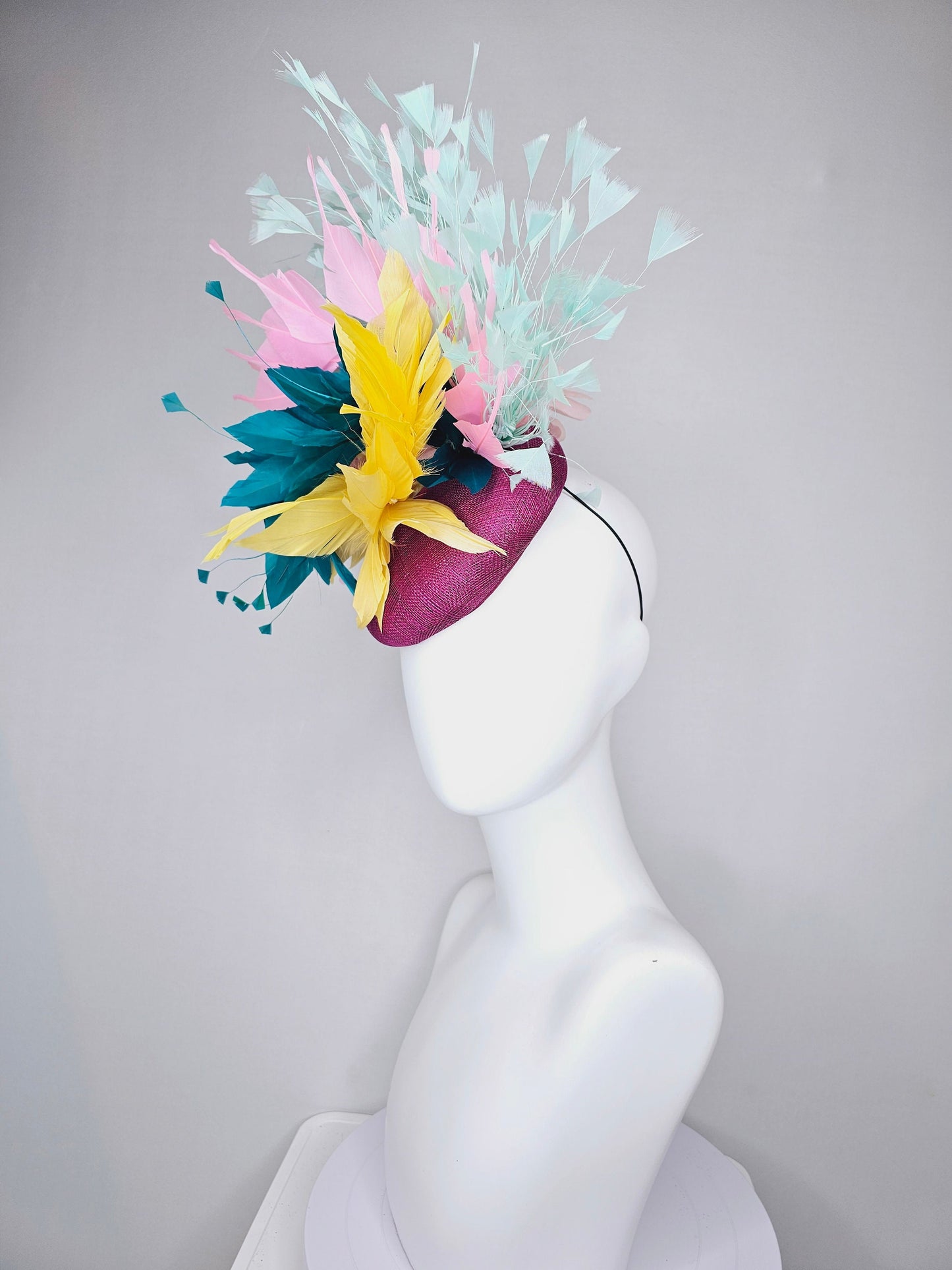 kentucky derby hat fascinator purple violet sinamay with colorful bright yellow, teal blue, baby pink, and baby blue branching feathers