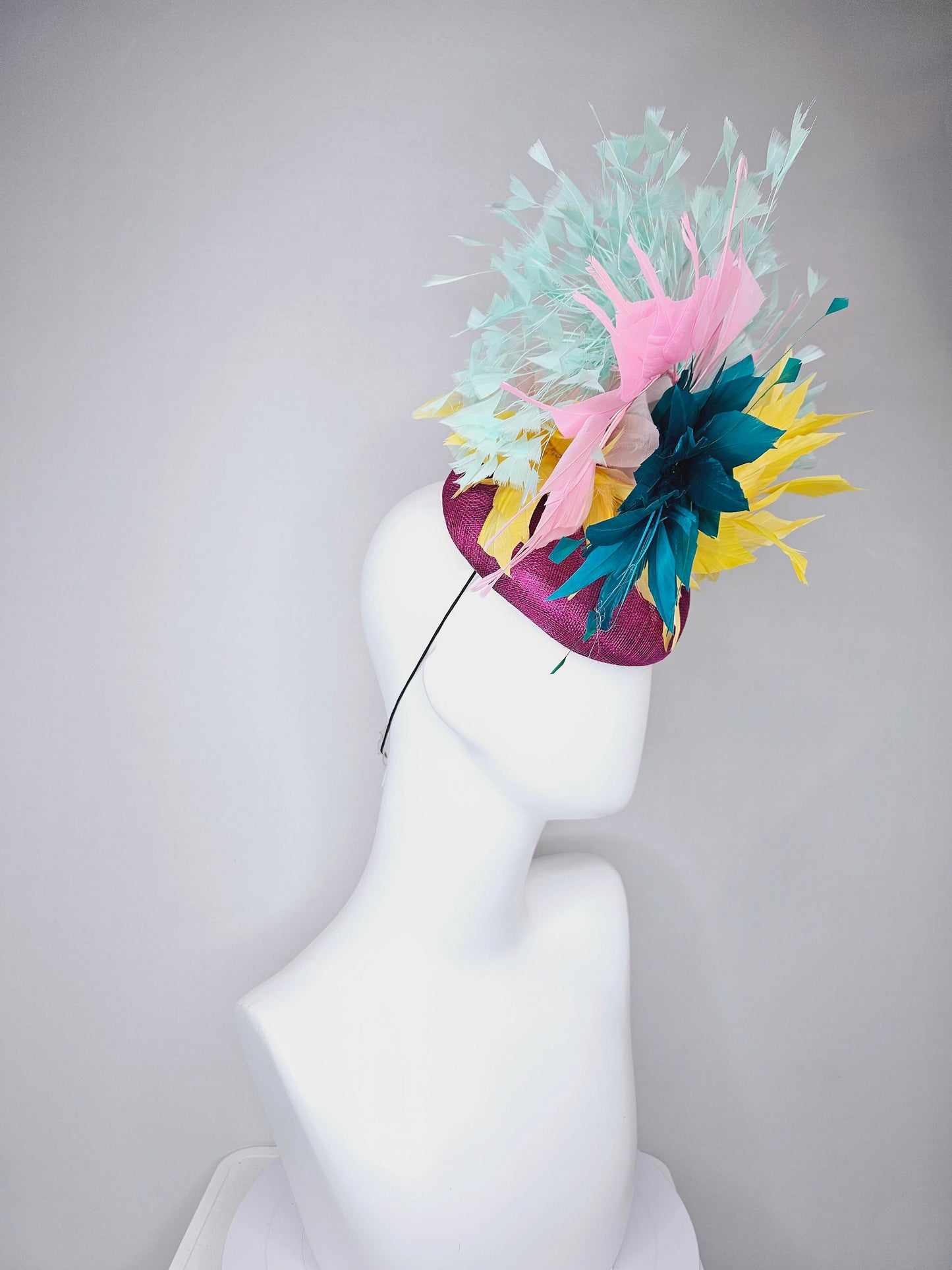 kentucky derby hat fascinator purple violet sinamay with colorful bright yellow, teal blue, baby pink, and baby blue branching feathers