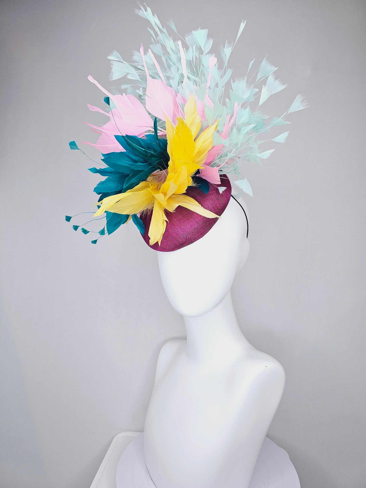 kentucky derby hat fascinator purple violet sinamay with colorful bright yellow, teal blue, baby pink, and baby blue branching feathers