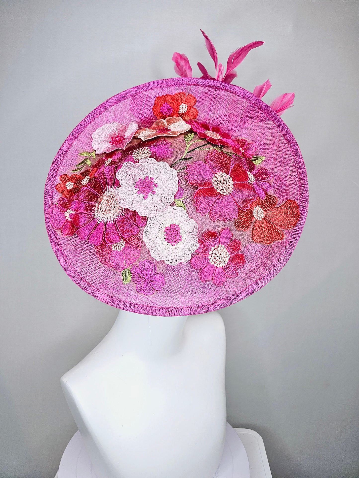 kentucky derby hat fascinator pink sinamay saucer with red pink green ivory floral embroidered, and pink feathers