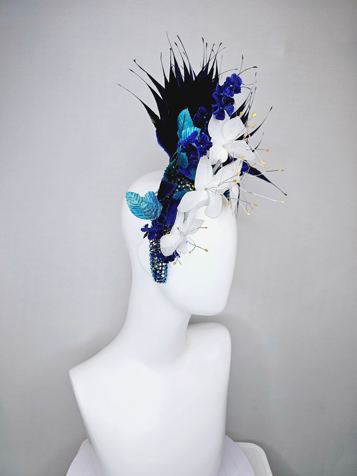 kentucky derby hat fascinator iridescent blue rhinestone crystal headband with white wire flowers,midnight blue feathers,blue velvet leaves