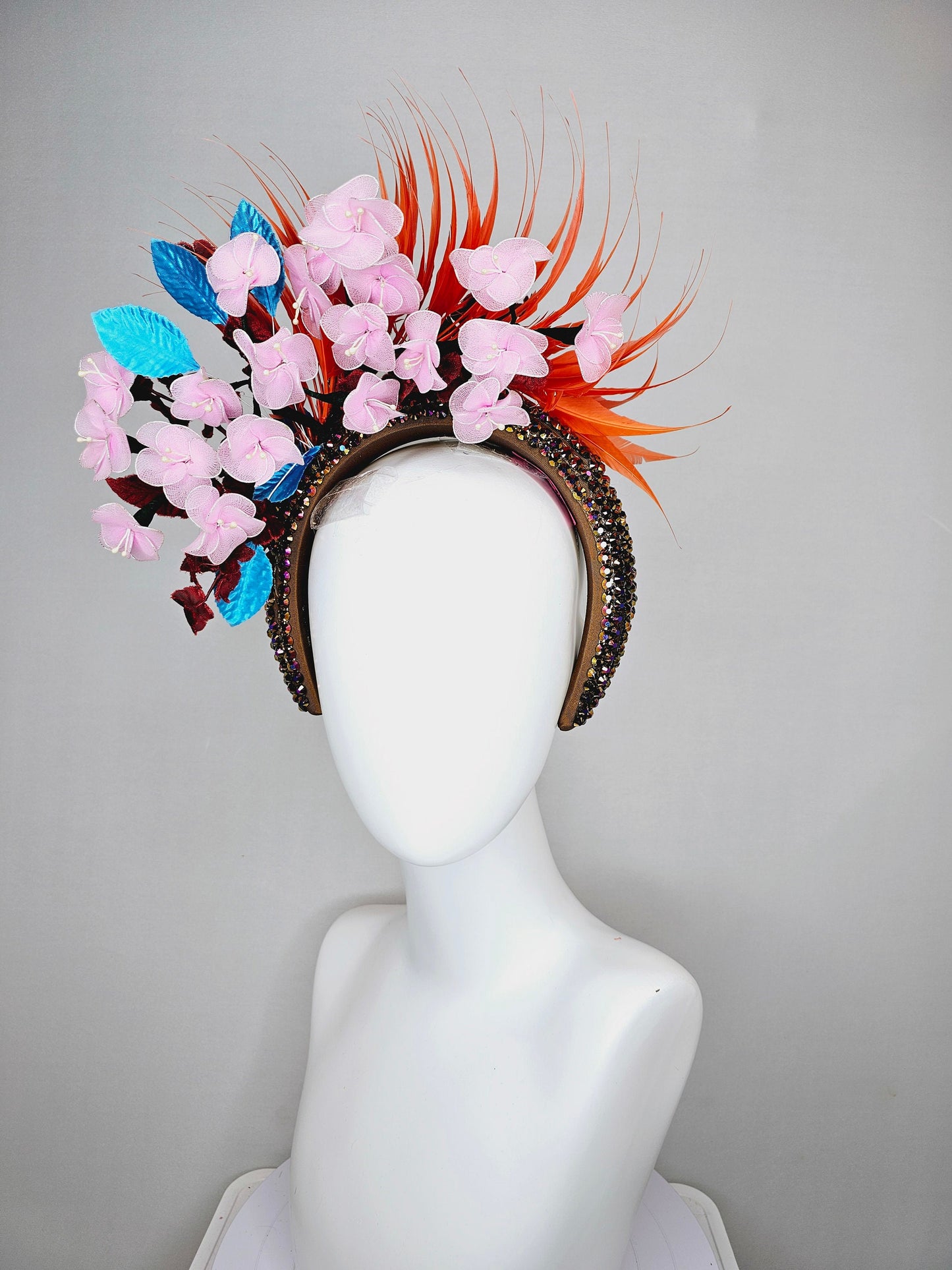 kentucky derby hat fascinator swarovski crystal rhinestone headband in brown iridescent brunette with light pink flowers,and orange feathers