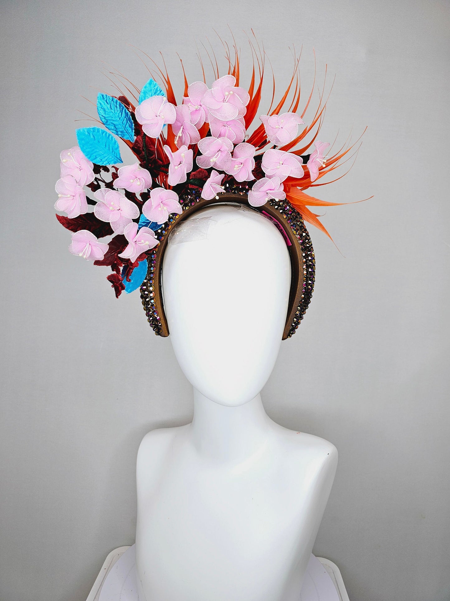 kentucky derby hat fascinator swarovski crystal rhinestone headband in brown iridescent brunette with light pink flowers,and orange feathers