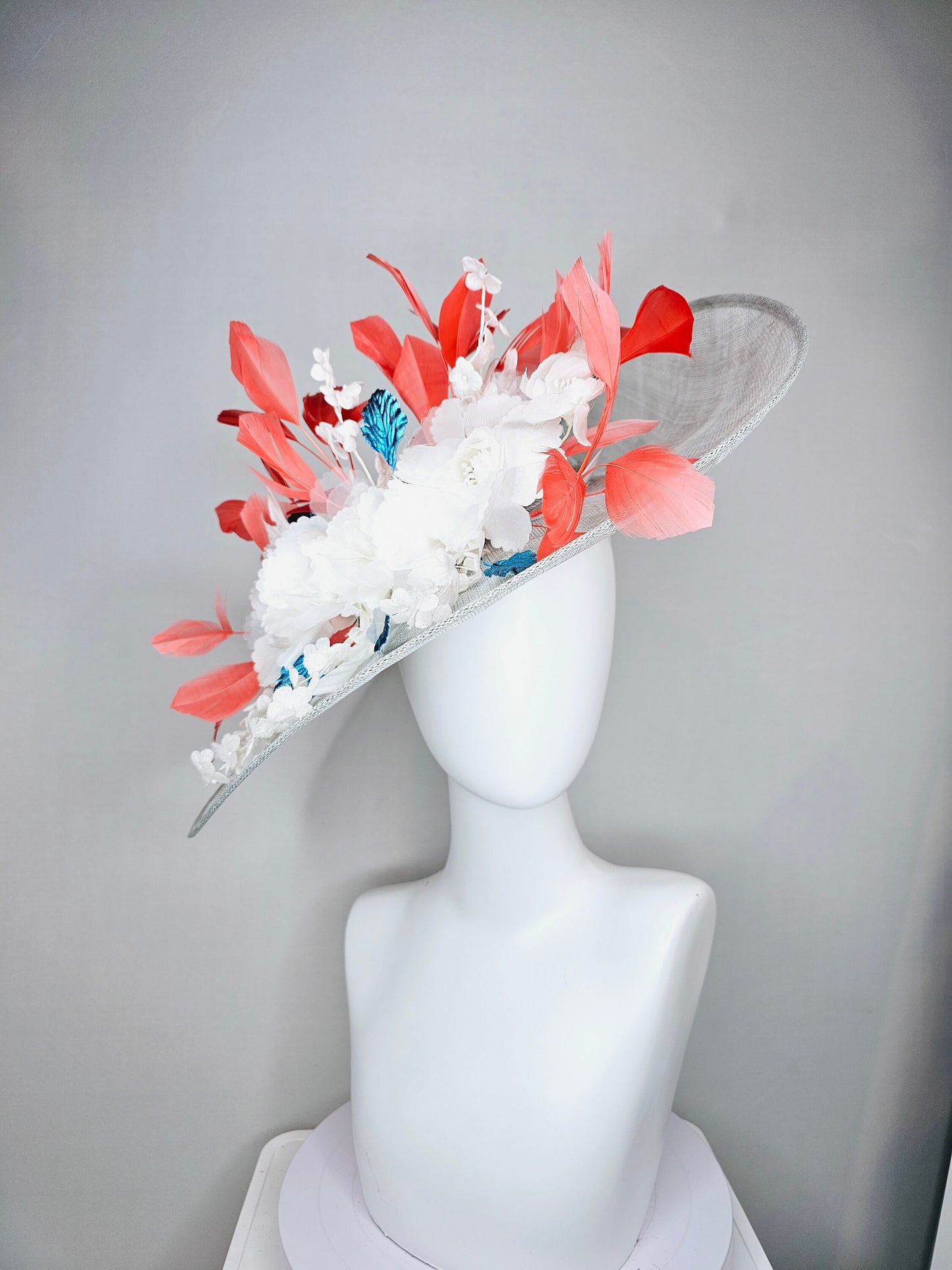 kentucky derby hat large wide brim sinamay gray hat with white ivory organza flowers and blue leaves with coral orange branching feathers