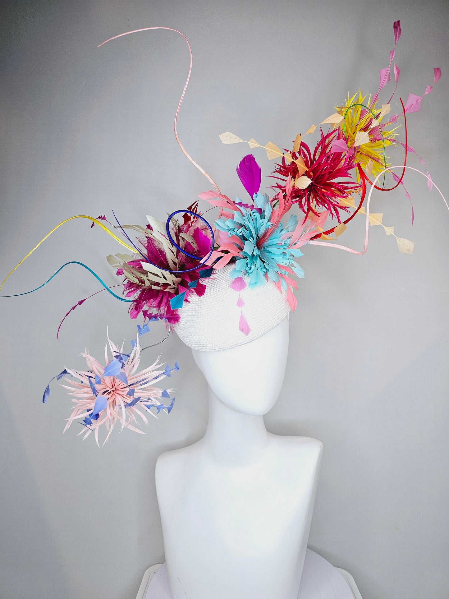 kentucky derby hat fascinator rainbow huge blue red yellow green pink orange avant garde feather headpiece on white base