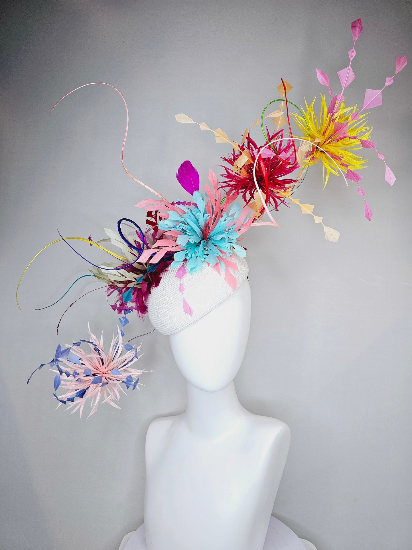 kentucky derby hat fascinator rainbow huge blue red yellow green pink orange avant garde feather headpiece on white base