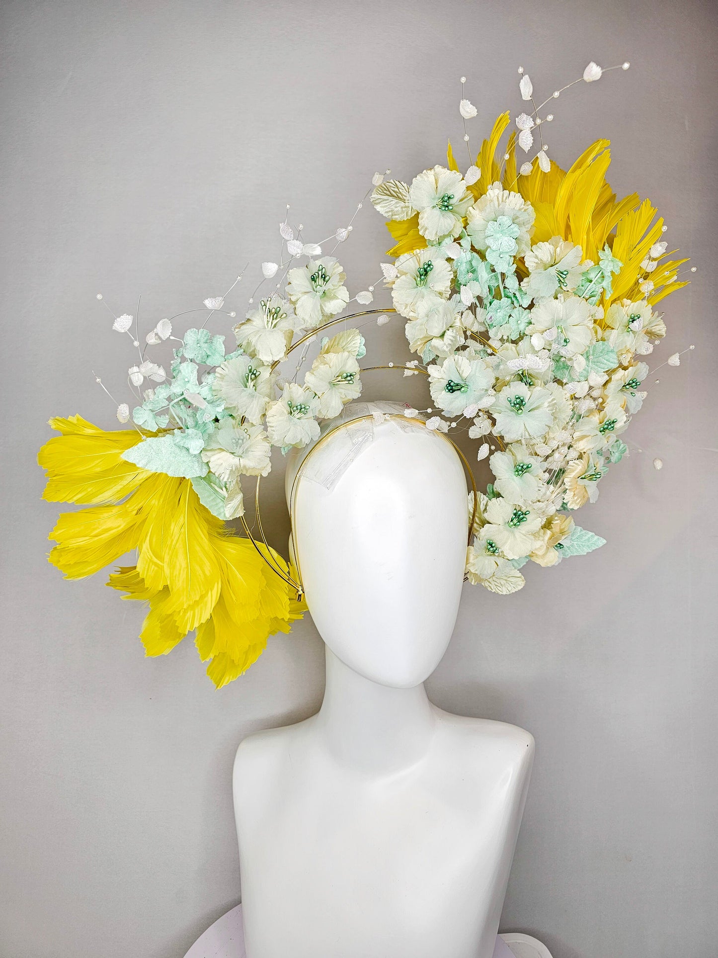 kentucky derby hat fascinator vintage branching mint green and gold flowers on tiered silver metallic headband with bright yellow feathers