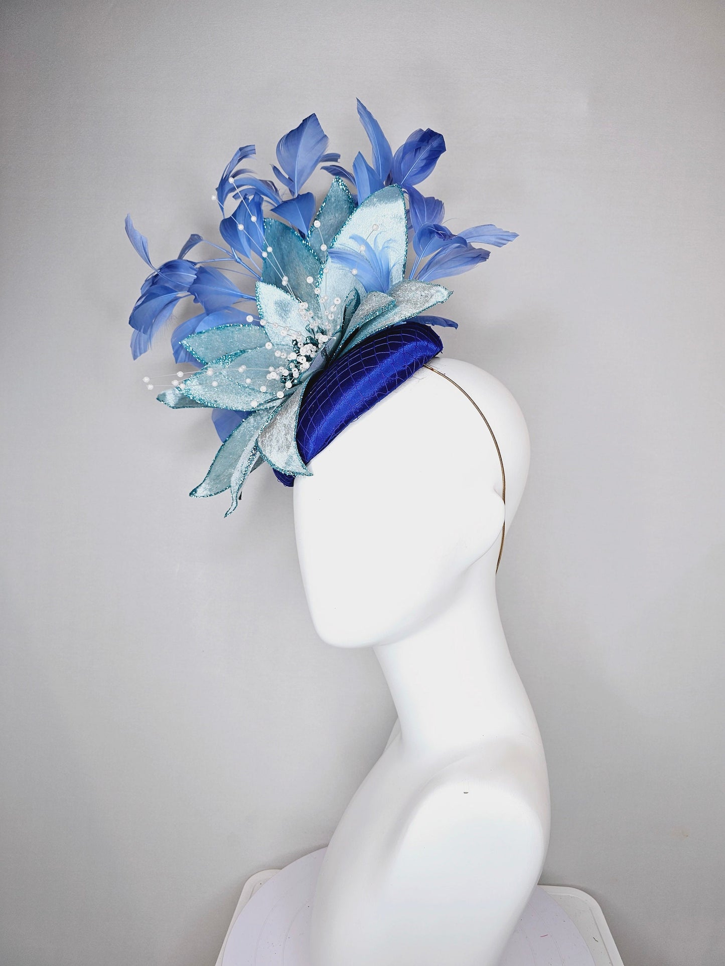 kentucky derby hat fascinator royal blue satin with periwinkle blue feathers and large light blue velvet flower with white pearl decor