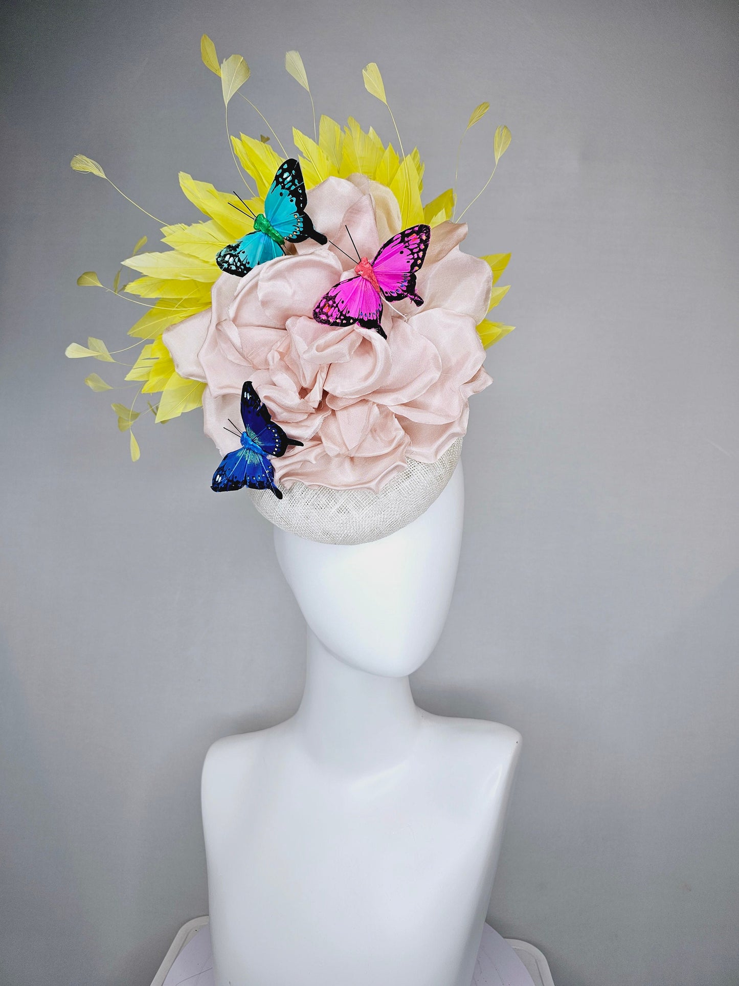kentucky derby hat fascinator white sinamay blush large satin flower yellow feathers and rainbow pink blue green butterflies