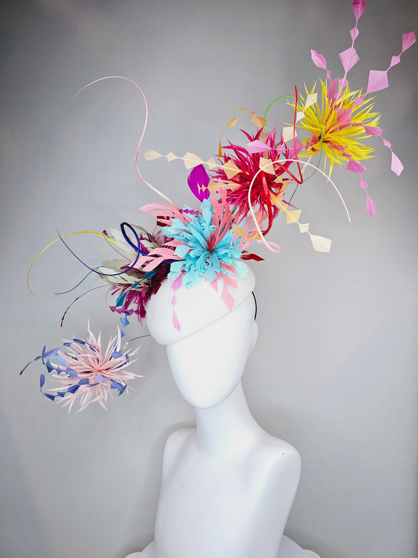 kentucky derby hat fascinator rainbow huge blue red yellow green pink orange avant garde feather headpiece on white base