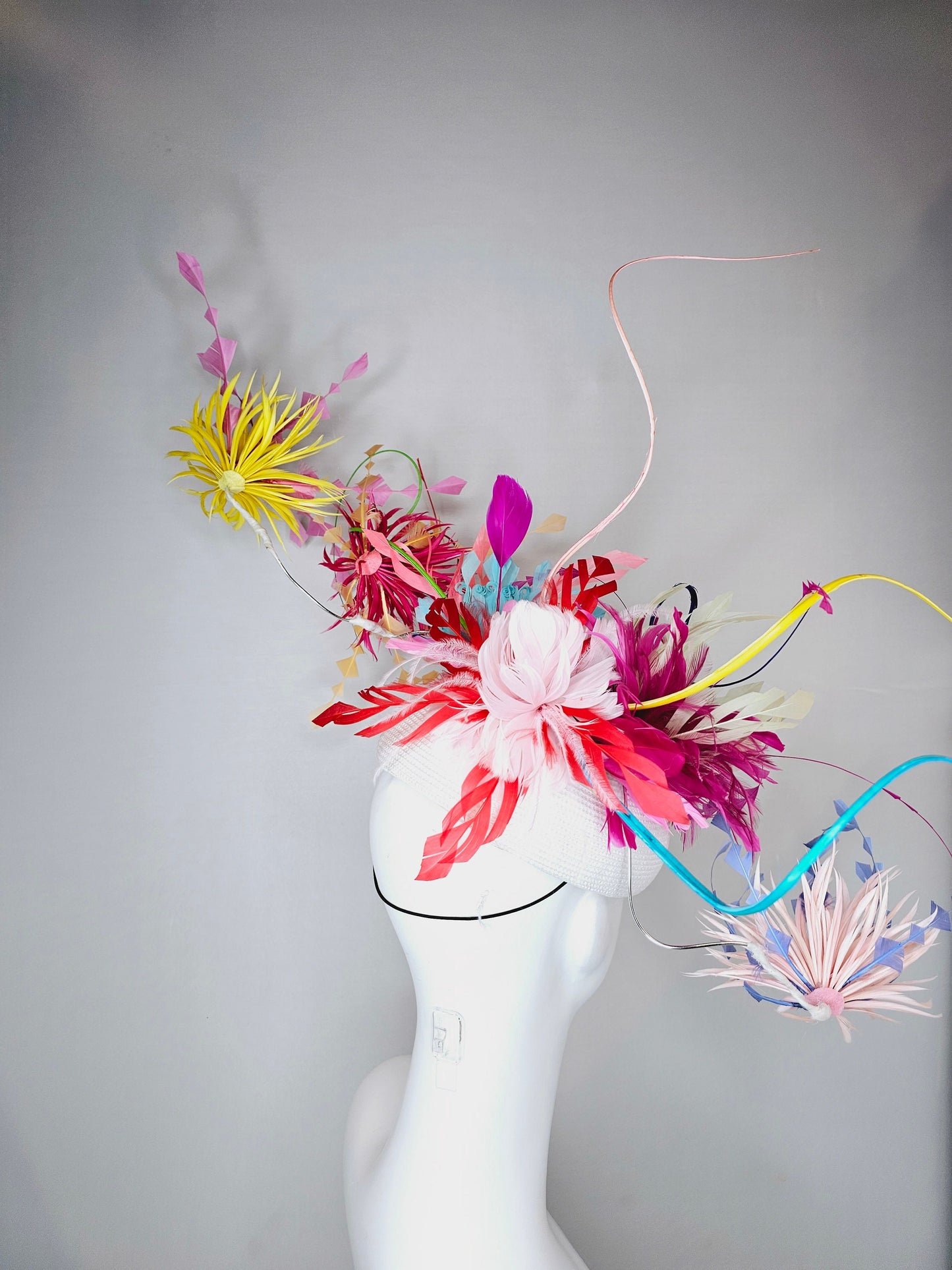 kentucky derby hat fascinator rainbow huge blue red yellow green pink orange avant garde feather headpiece on white base