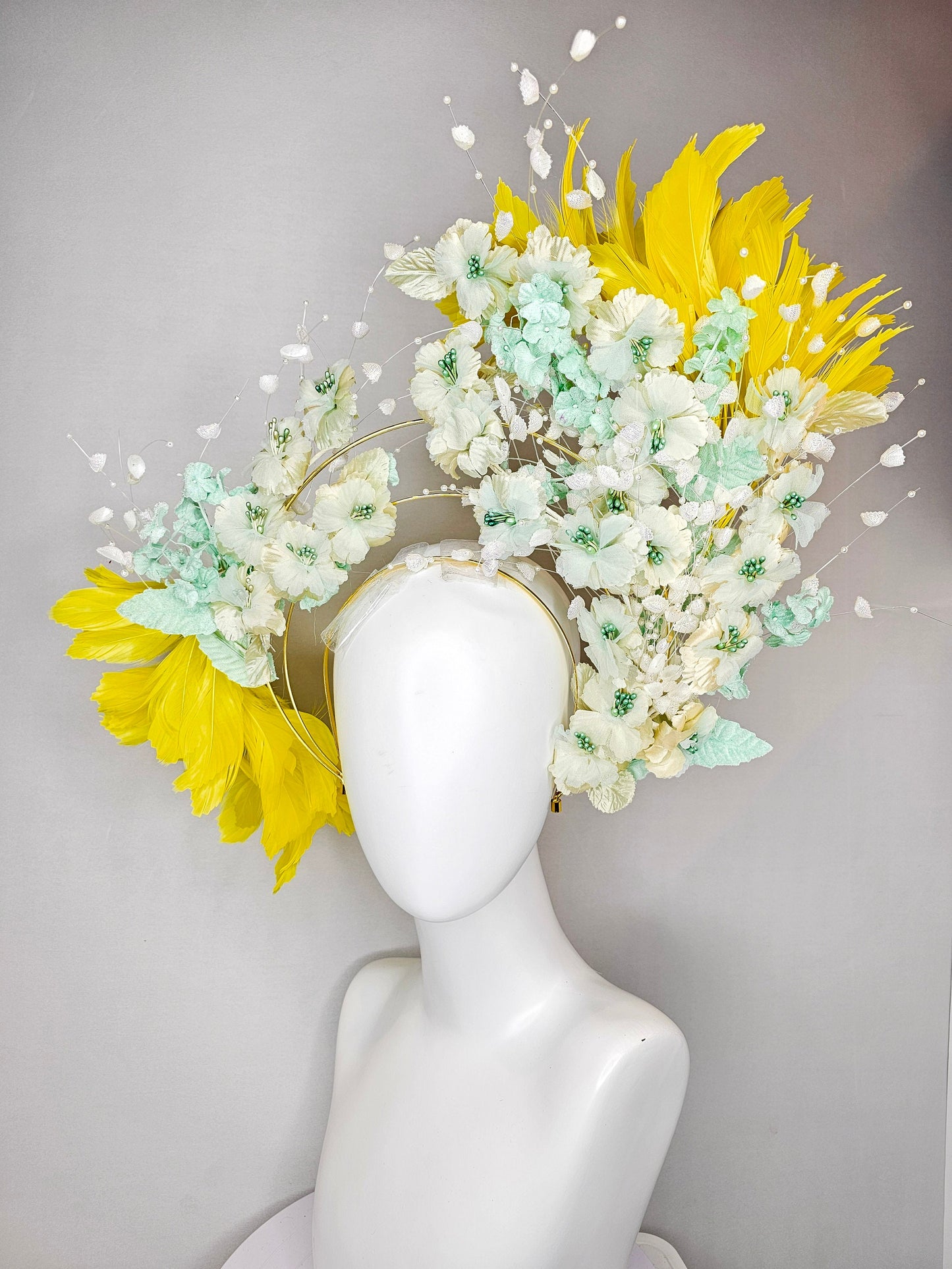 kentucky derby hat fascinator vintage branching mint green and gold flowers on tiered silver metallic headband with bright yellow feathers