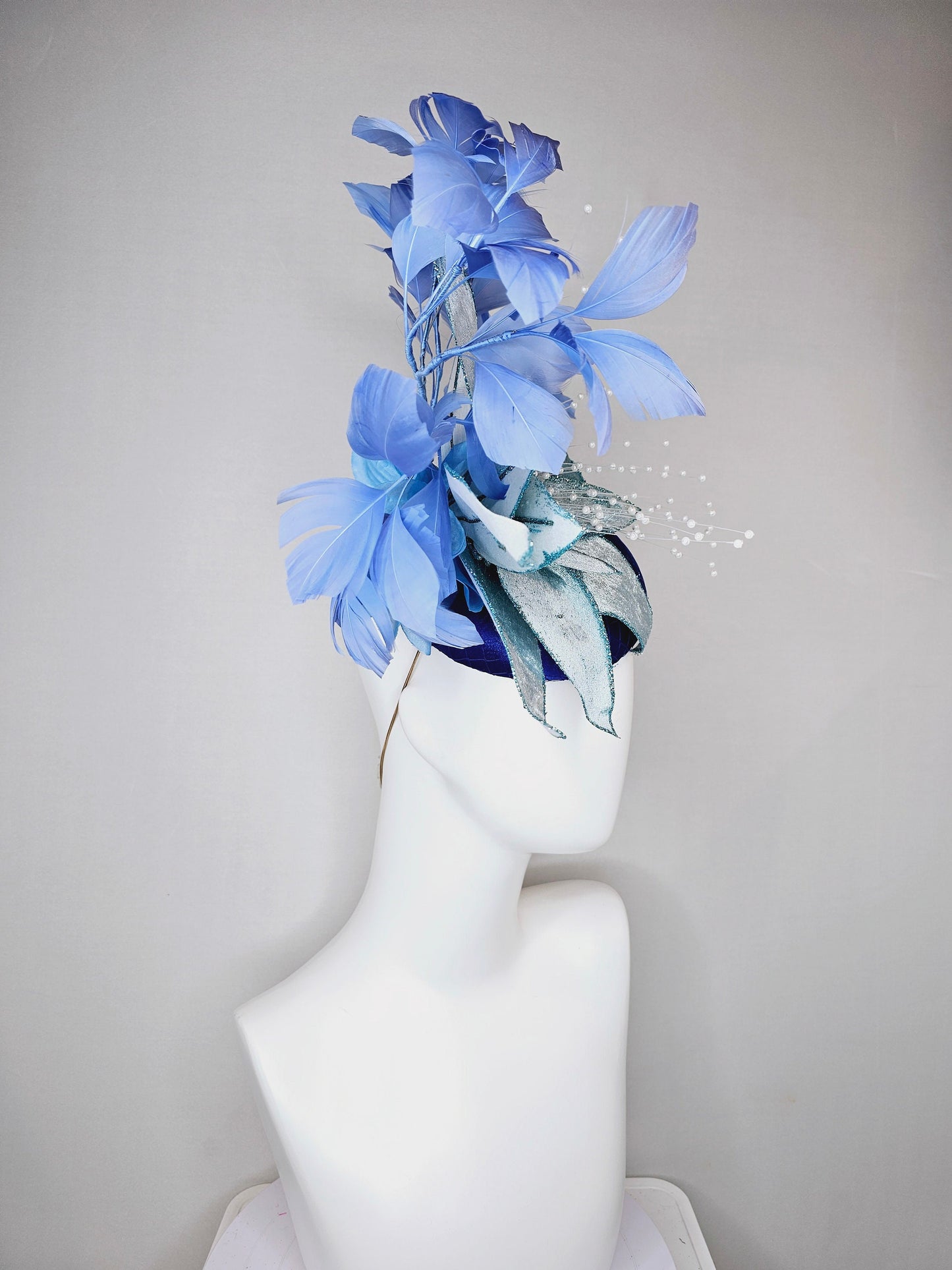 kentucky derby hat fascinator royal blue satin with periwinkle blue feathers and large light blue velvet flower with white pearl decor
