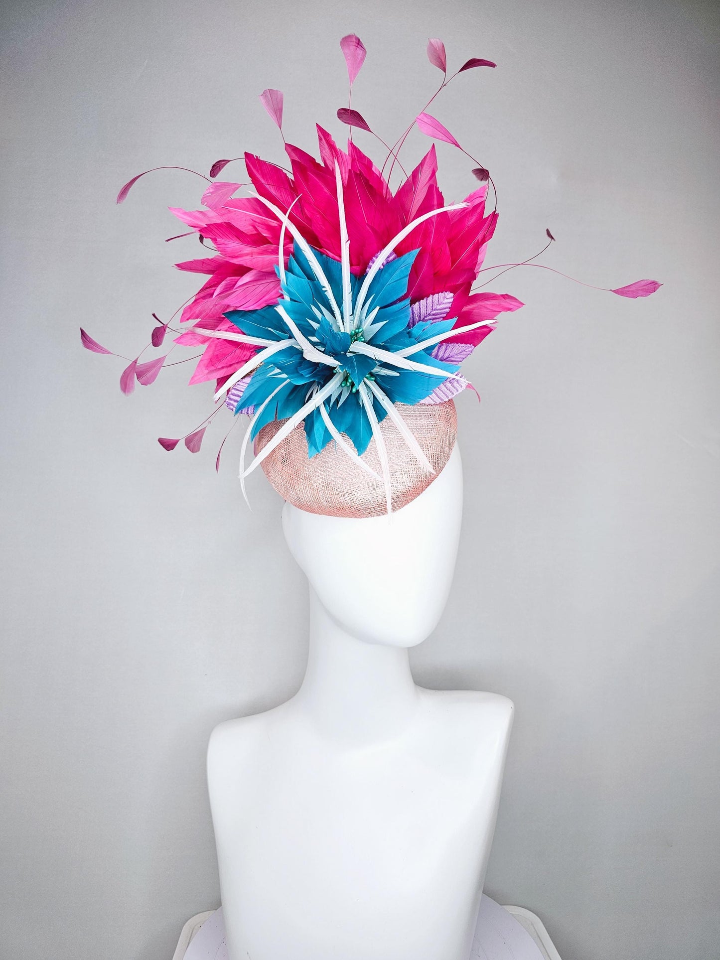 kentucky derby hat fascinator light pink sinamay with royal blue feather flower with fuchsia hot pink feathers and purple velvet leaves