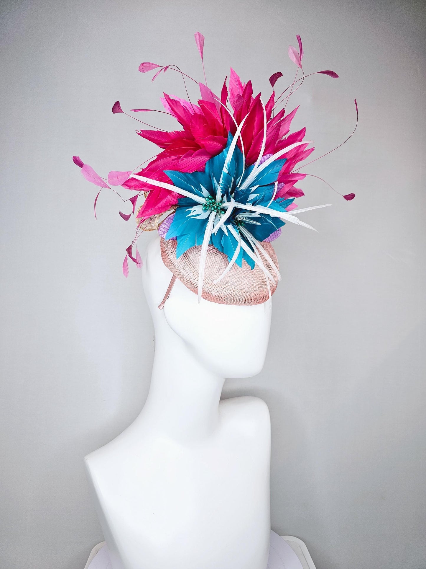 kentucky derby hat fascinator light pink sinamay with royal blue feather flower with fuchsia hot pink feathers and purple velvet leaves