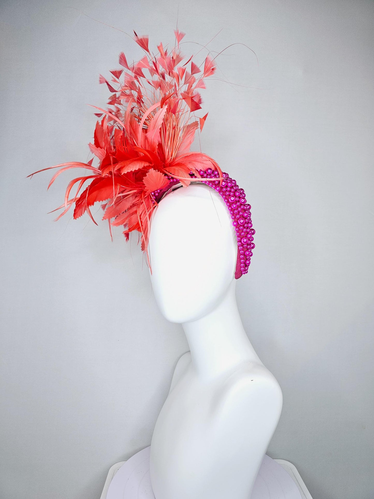 kentucky derby hat fascinator peach light coral orange feather flowers with bright pink fuchsia pearl headband