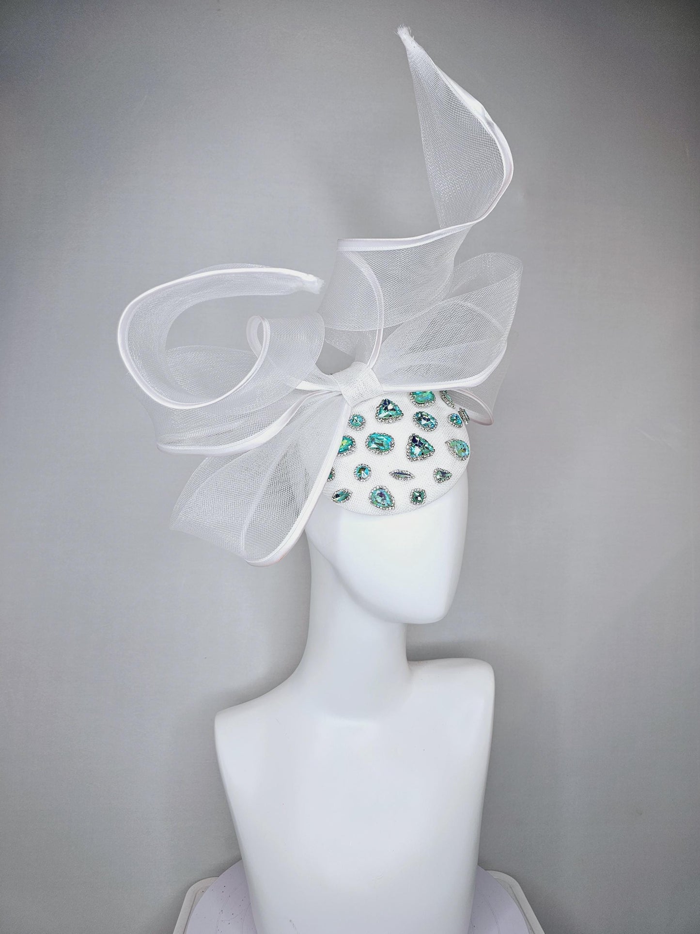 kentucky derby hat fascinator ivory white fabric base w/ mesh and wired ribbon large bendable bow decor,turquoise blue green crystal jewels