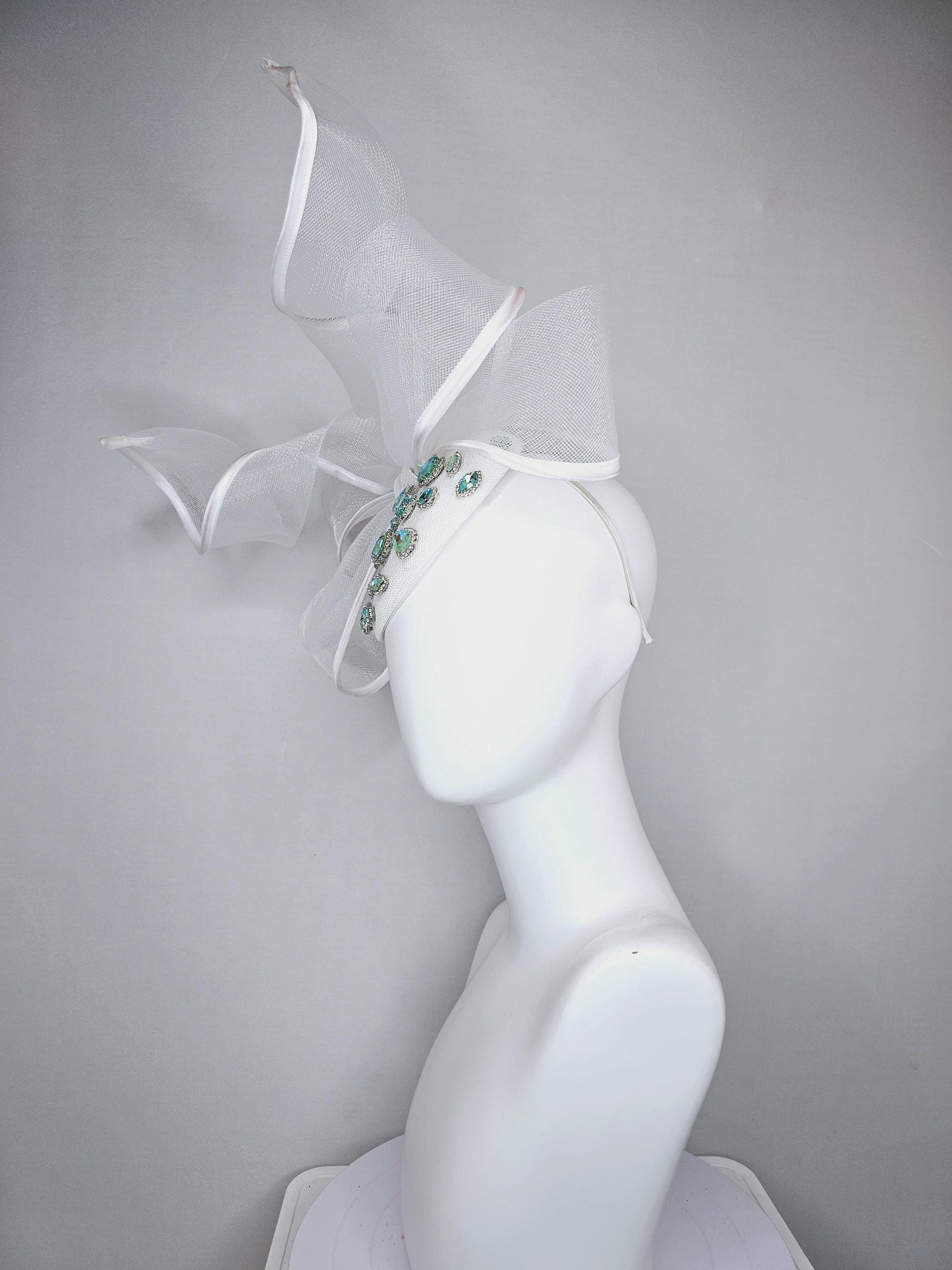 kentucky derby hat fascinator ivory white fabric base with mesh and wired ribbon large bendable bow turquoise blue green crystal jewels