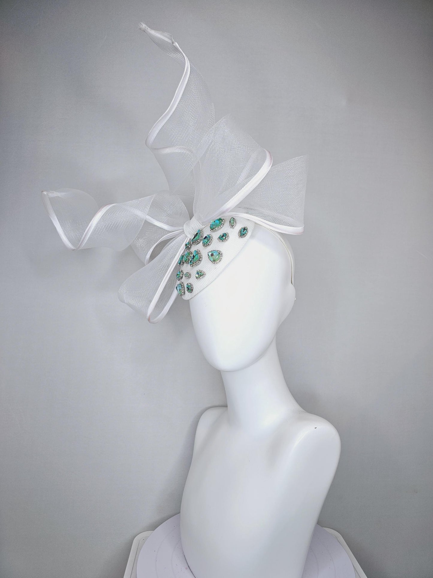 kentucky derby hat fascinator ivory white fabric base w/ mesh and wired ribbon large bendable bow decor,turquoise blue green crystal jewels