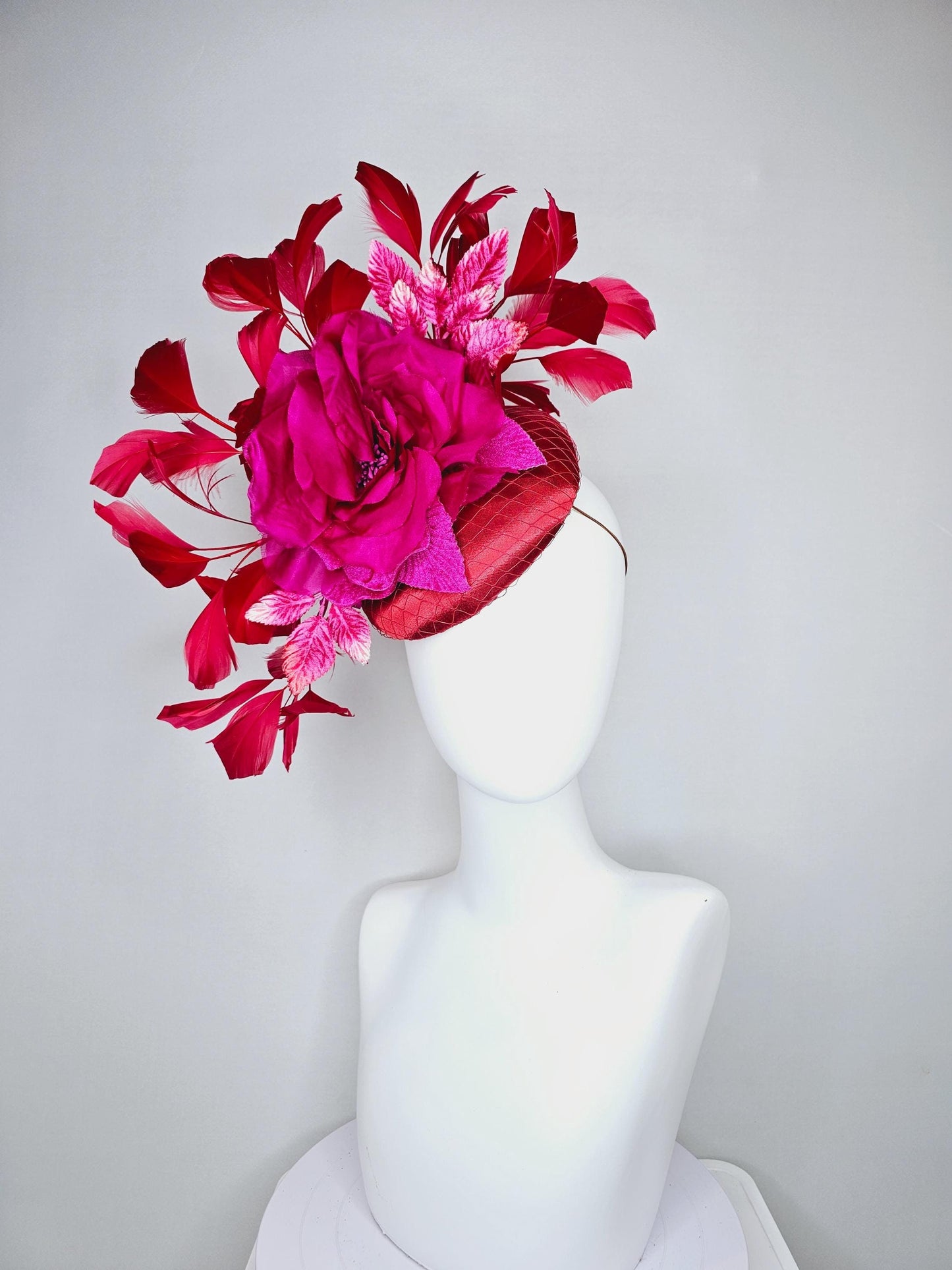 kentucky derby hat fascinator red satin with bright pink satin organza rose flower with red branching red feathers
