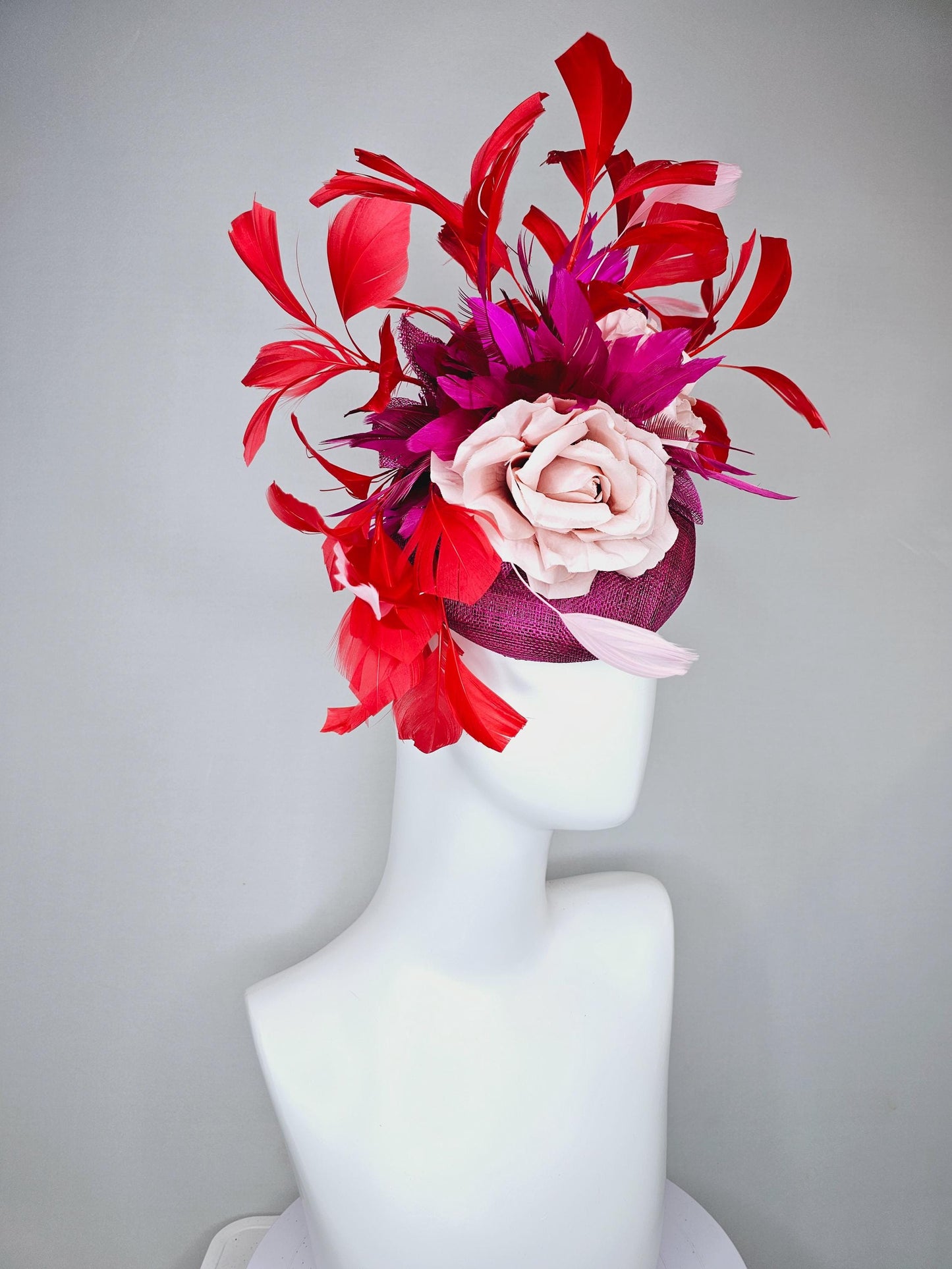 kentucky derby hat fascinator dark fuchsia purple sinamay, light pink satin organza rose flowers with red,pink,fuchsia branching feathers