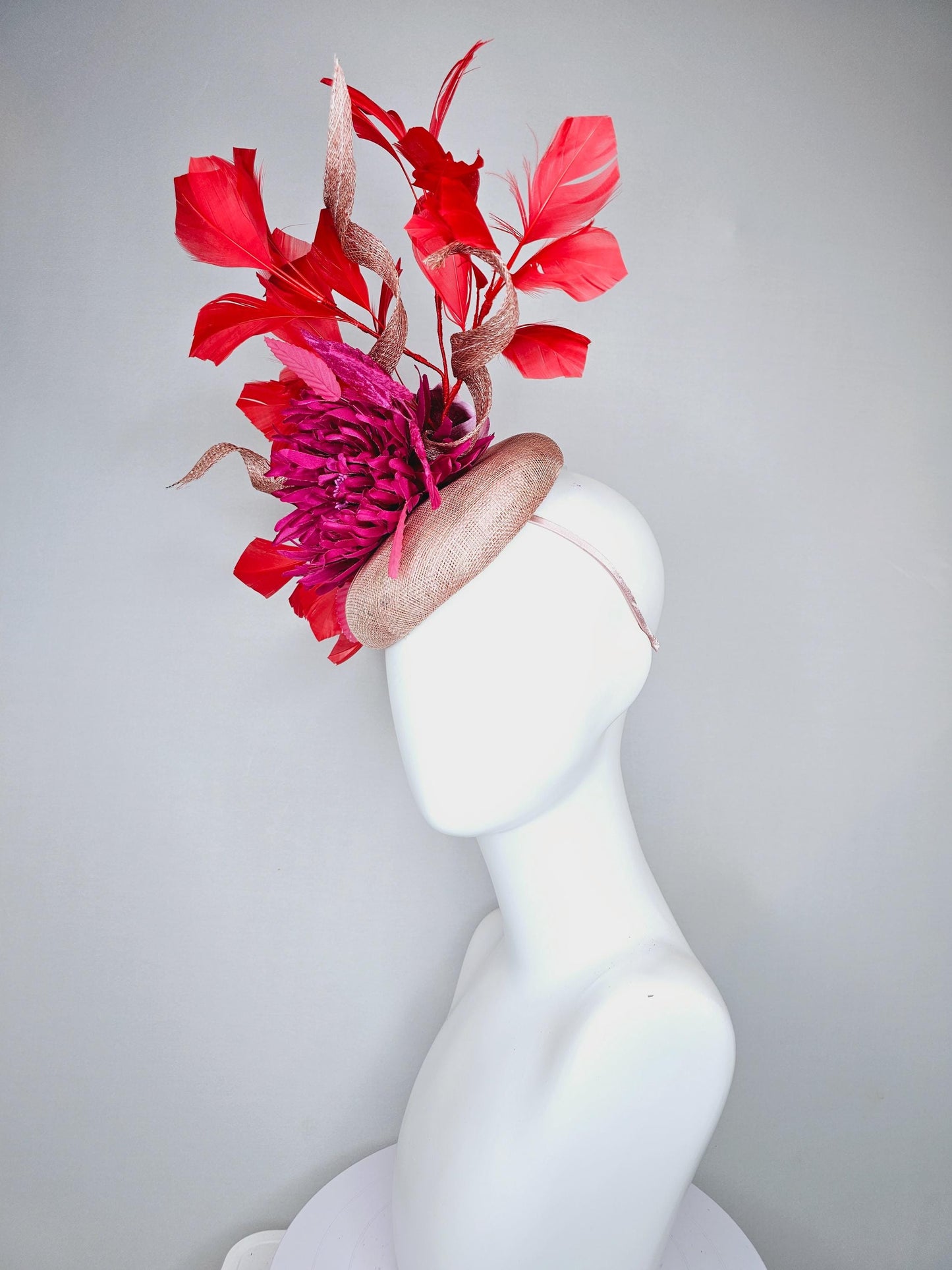 kentucky derby hat fascinator dusty light pink sinamay with hot pink fuchsia satin flower and leaves,sinamay curls, branching red feathers