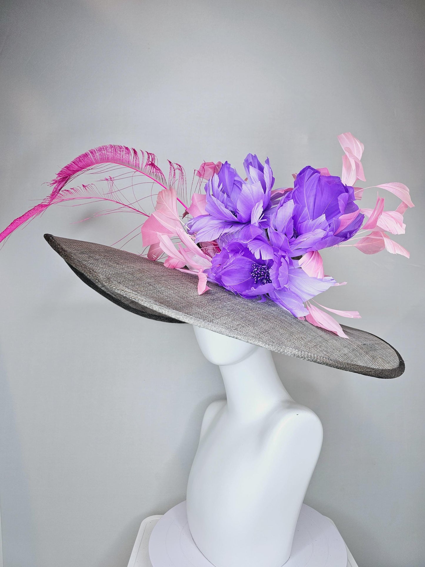 kentucky derby gray sinamay large wide brim hat with purple feather flowers and branching light pink feathers with hot pink long feathers