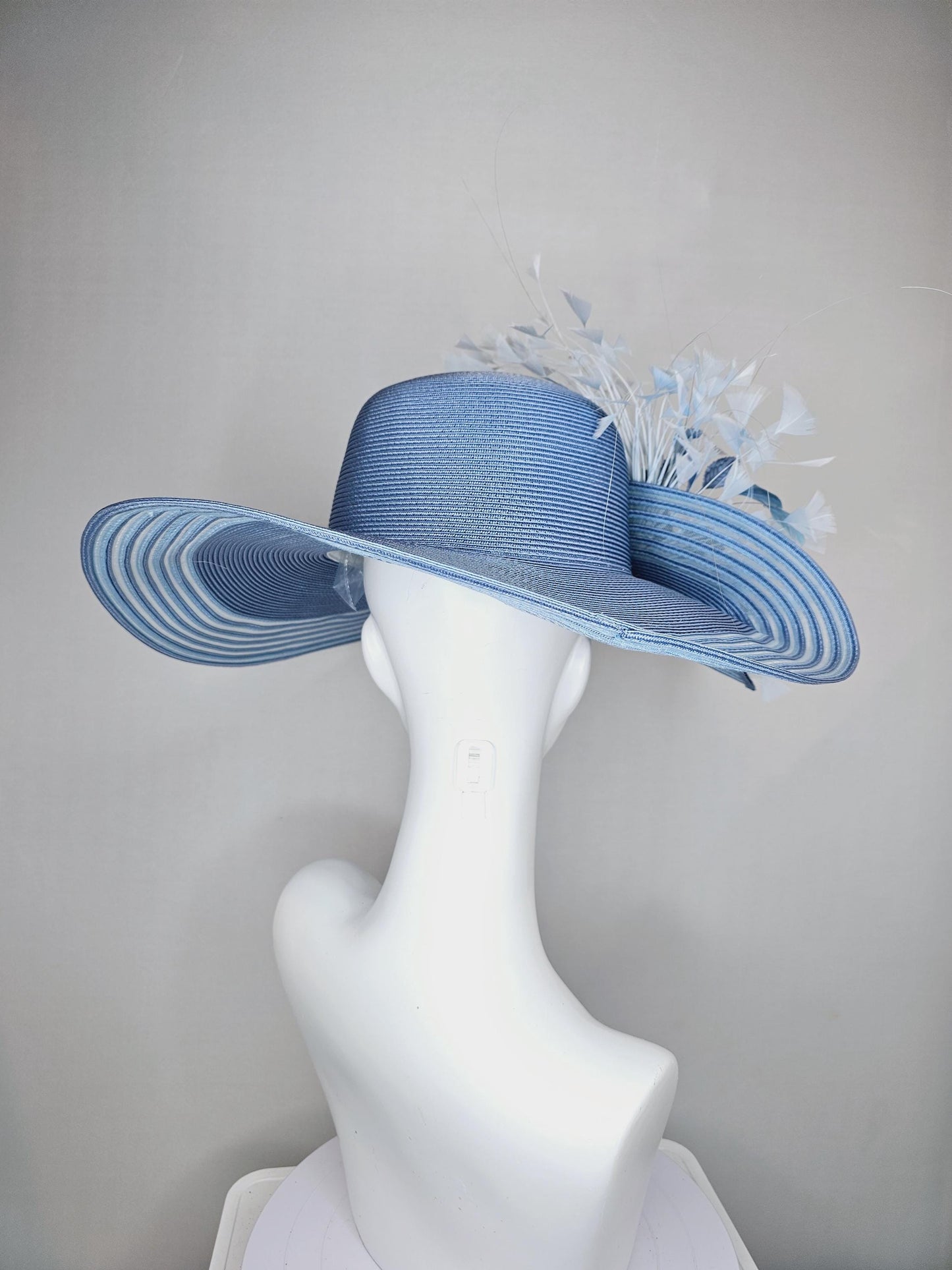 kentucky derby hat fascinator light sky blue wide brim sinamay with dusty blue silk flowers,light baby blue crinoline bow,light blue feather