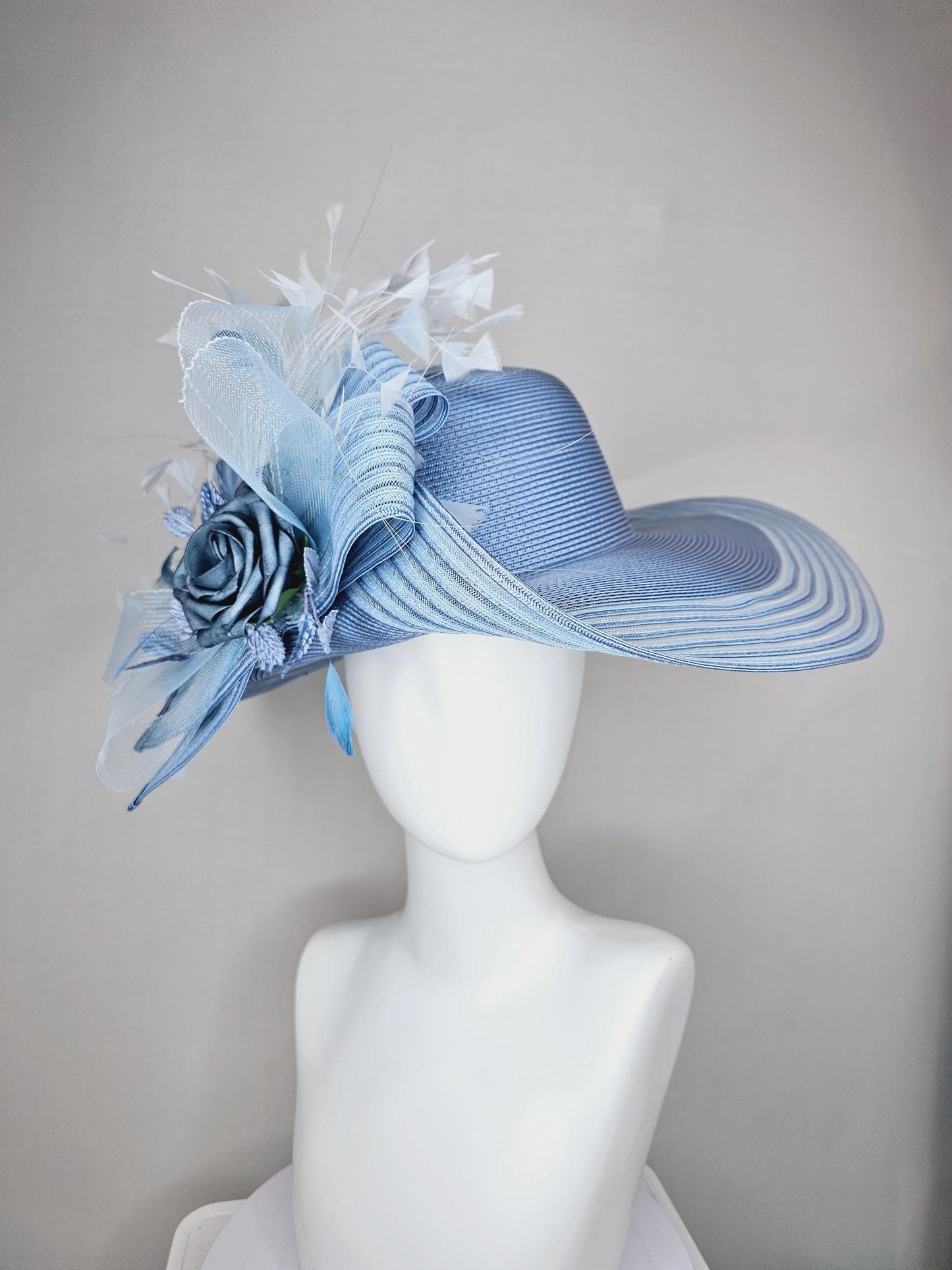 kentucky derby hat fascinator light sky blue wide brim sinamay with dusty blue silk flowers,light baby blue crinoline bow,light blue feather