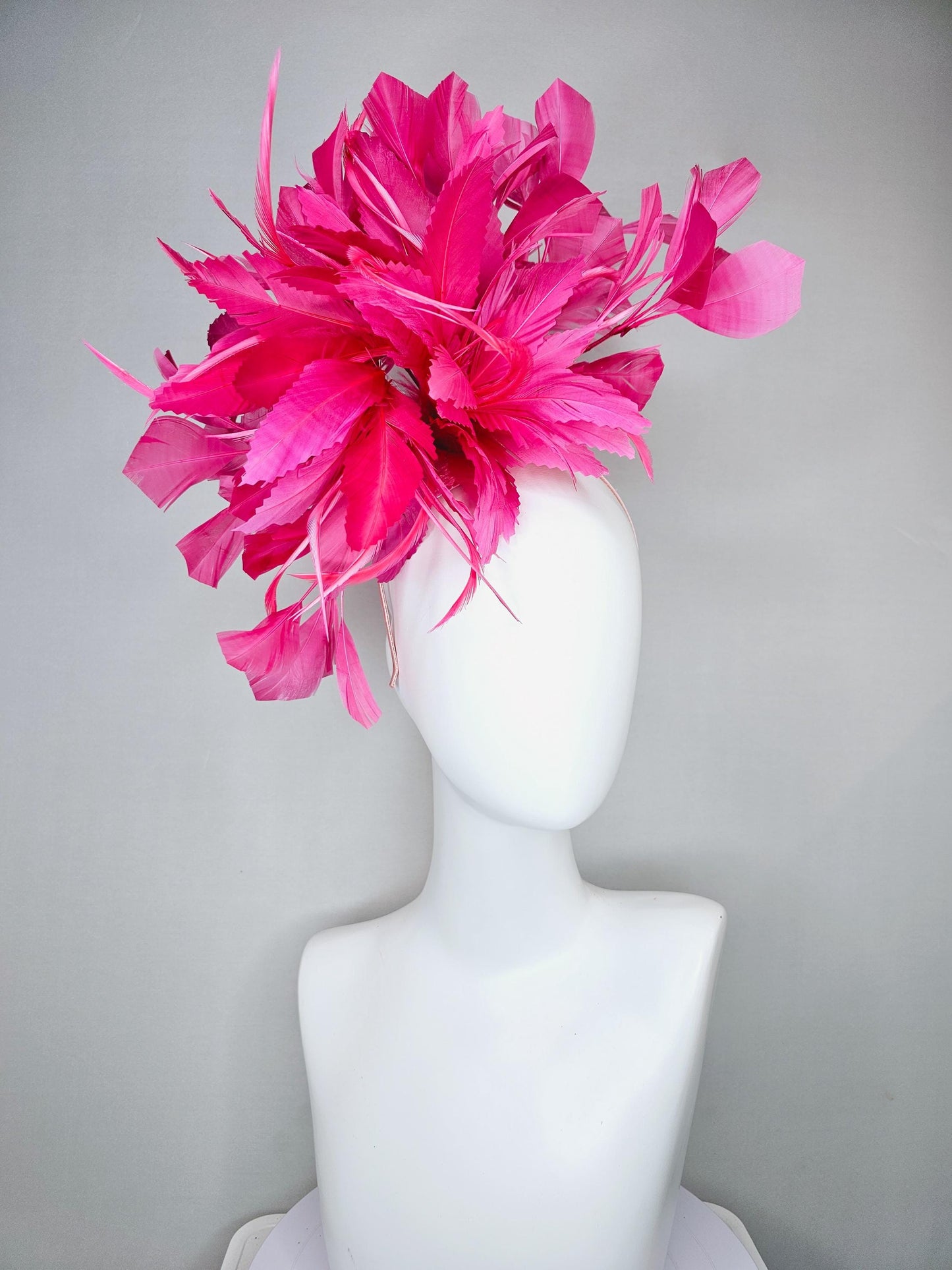 kentucky derby hat fascinator with bright hot pink branching feathers