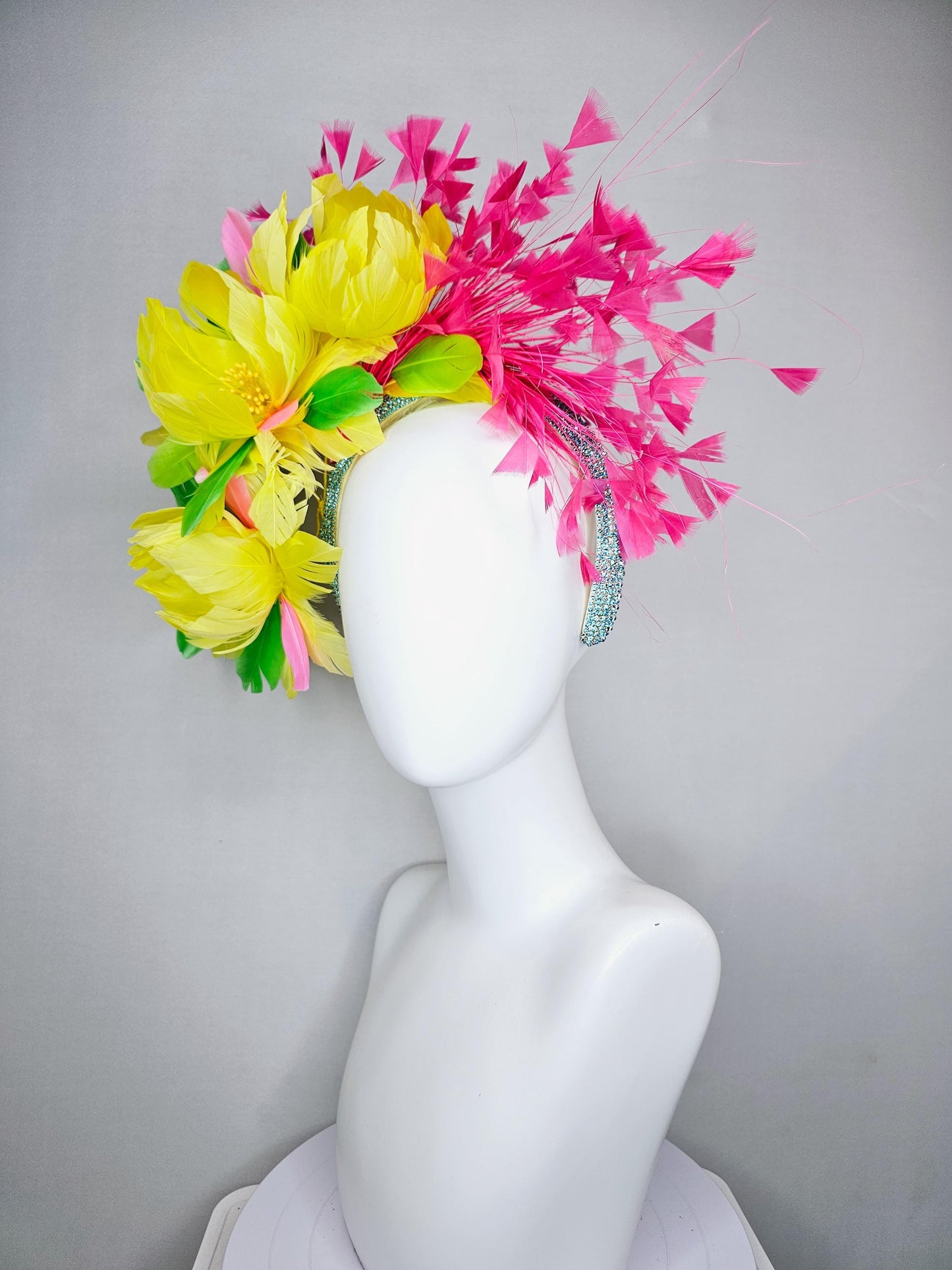 kentucky derby hat fascinator yellow feather flowers,green feather leaves,fuchsia pink branching feathers,sky blue rhinestone headband
