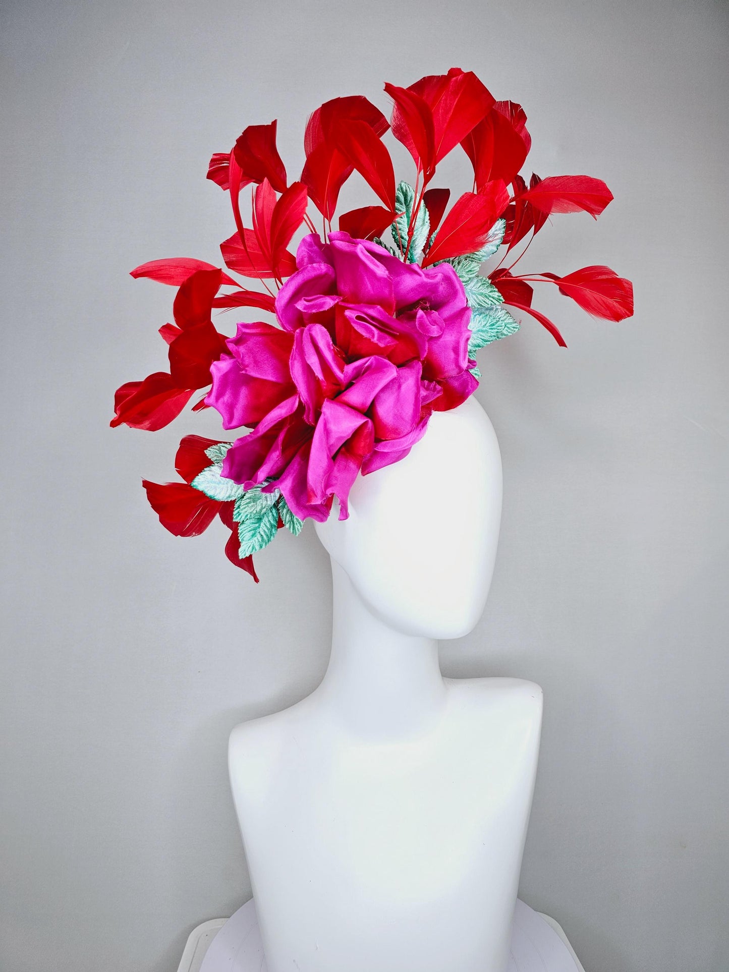 kentucky derby hat fascinator bright pink satin silk flower with aqua blue satin leaves and red coral branching feathers