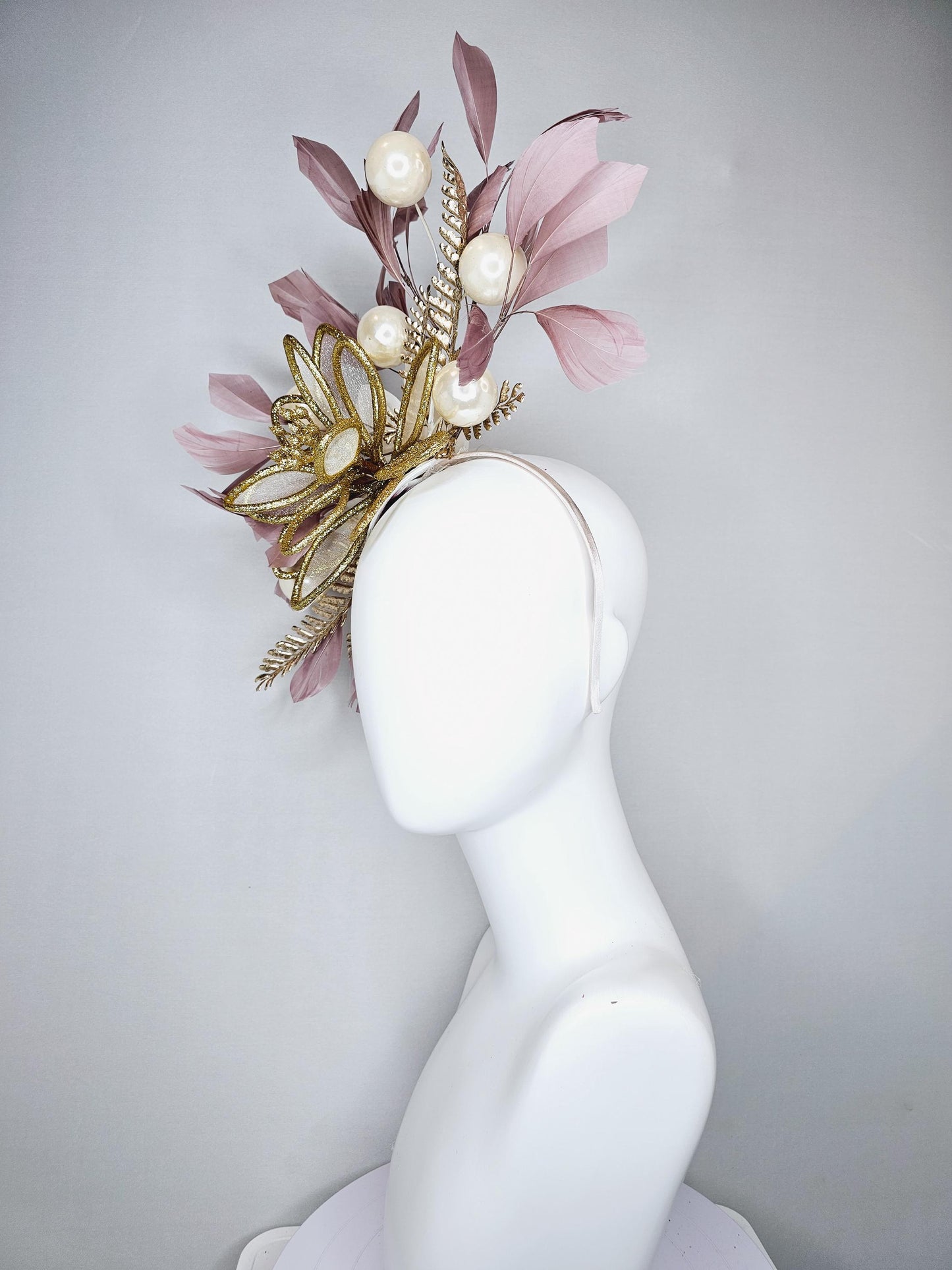 kentucky derby hat fascinator gold glitter flower with gold leaves, taupe brown branching feathers with pearls