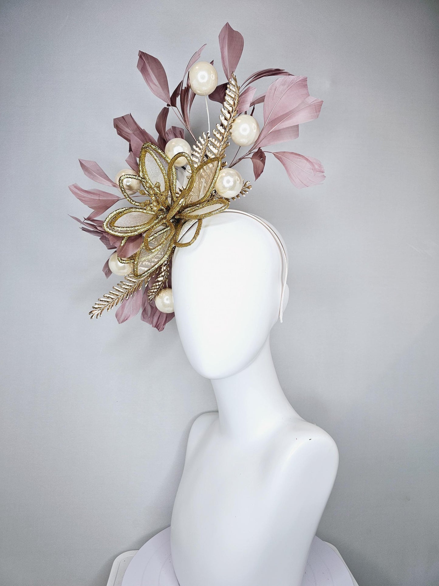 kentucky derby hat fascinator gold glitter flower with gold leaves, taupe brown branching feathers with pearls