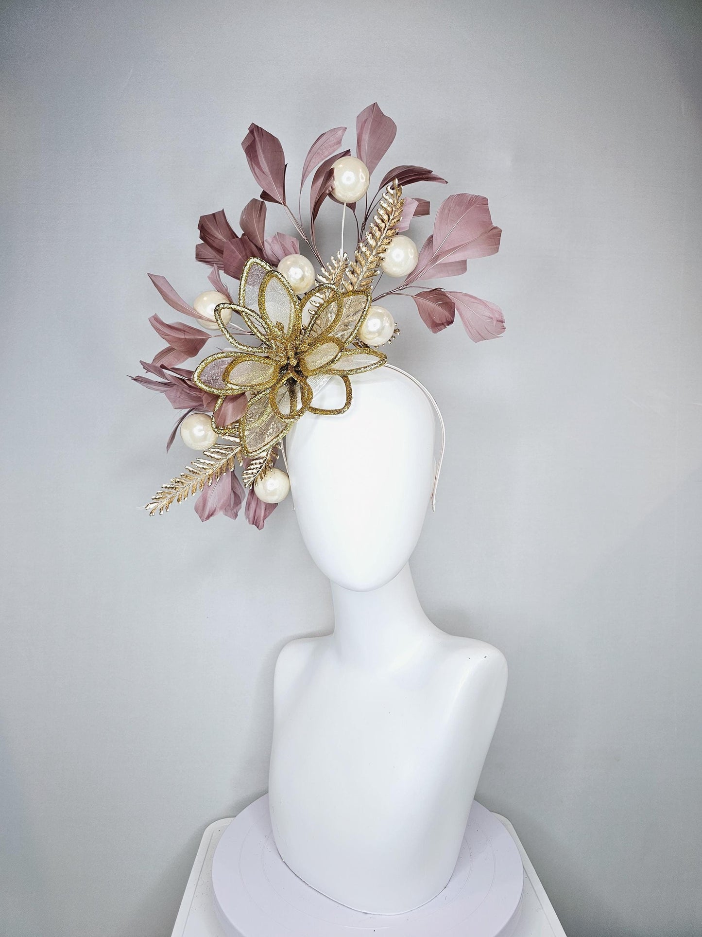 kentucky derby hat fascinator gold glitter flower with gold leaves, taupe brown branching feathers with pearls