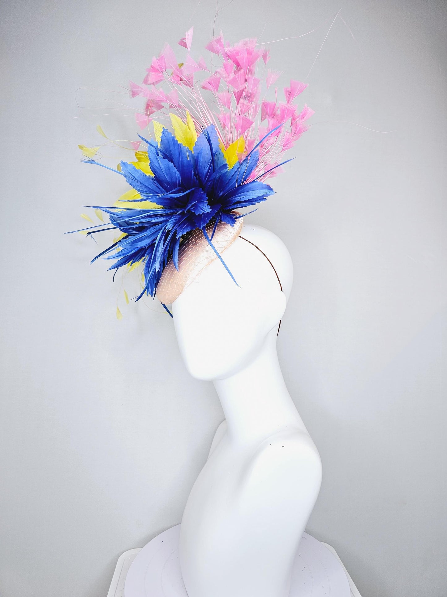 kentucky derby hat fascinator champagne satin with netting,cobalt royal blue and yellow feather flower, light blush pink branching feathers