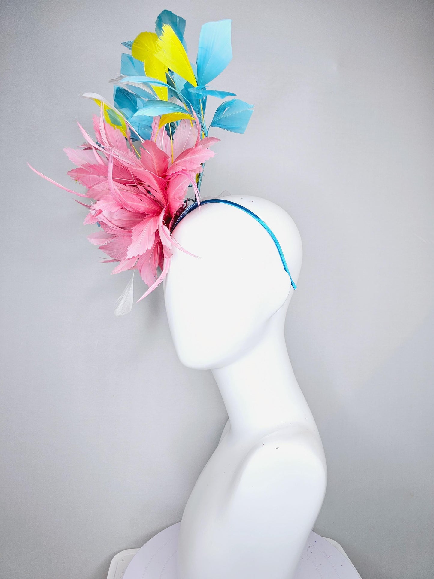 kentucky derby hat fascinator light blush pink rose feather flower, light turquoise aqua blue yellow white branching feathers, thin headband