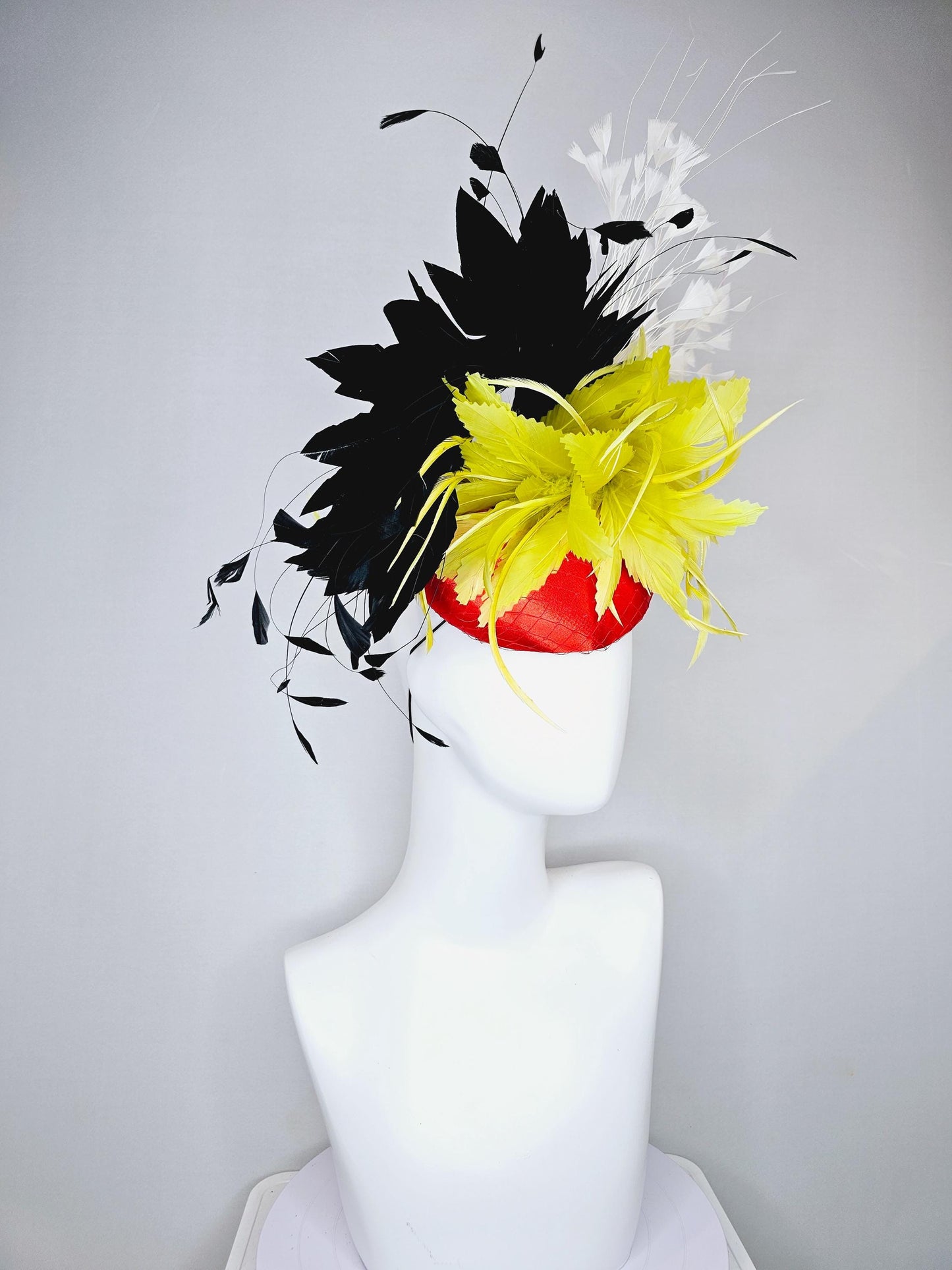 kentucky derby hat fascinator red satin with netting, yellow and black feather flower, white ivory branching feathers