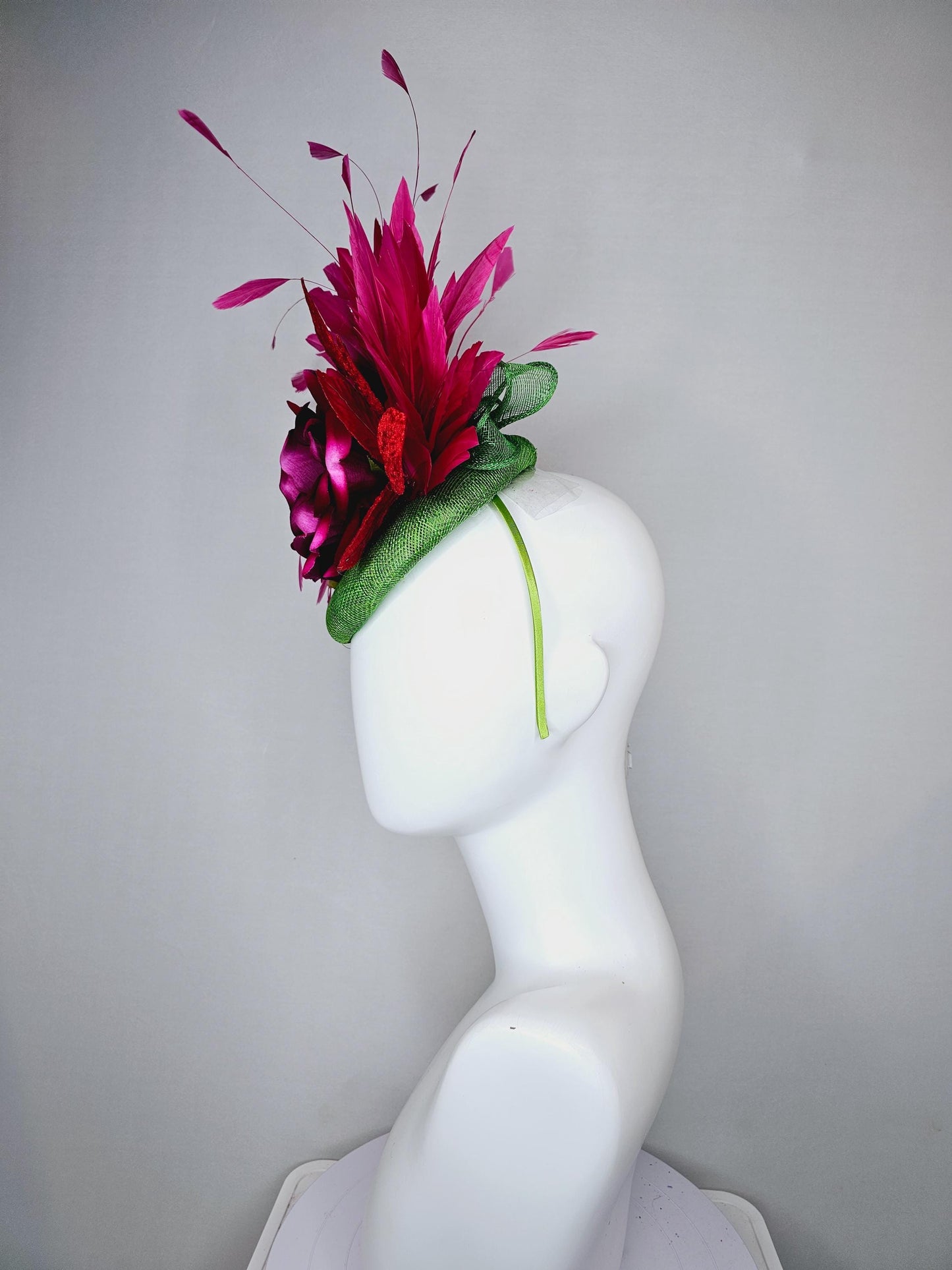 kentucky derby hat fascinator green sinamay with pink fuchsia satin silk rose flower and red leaves, pink branching feathers