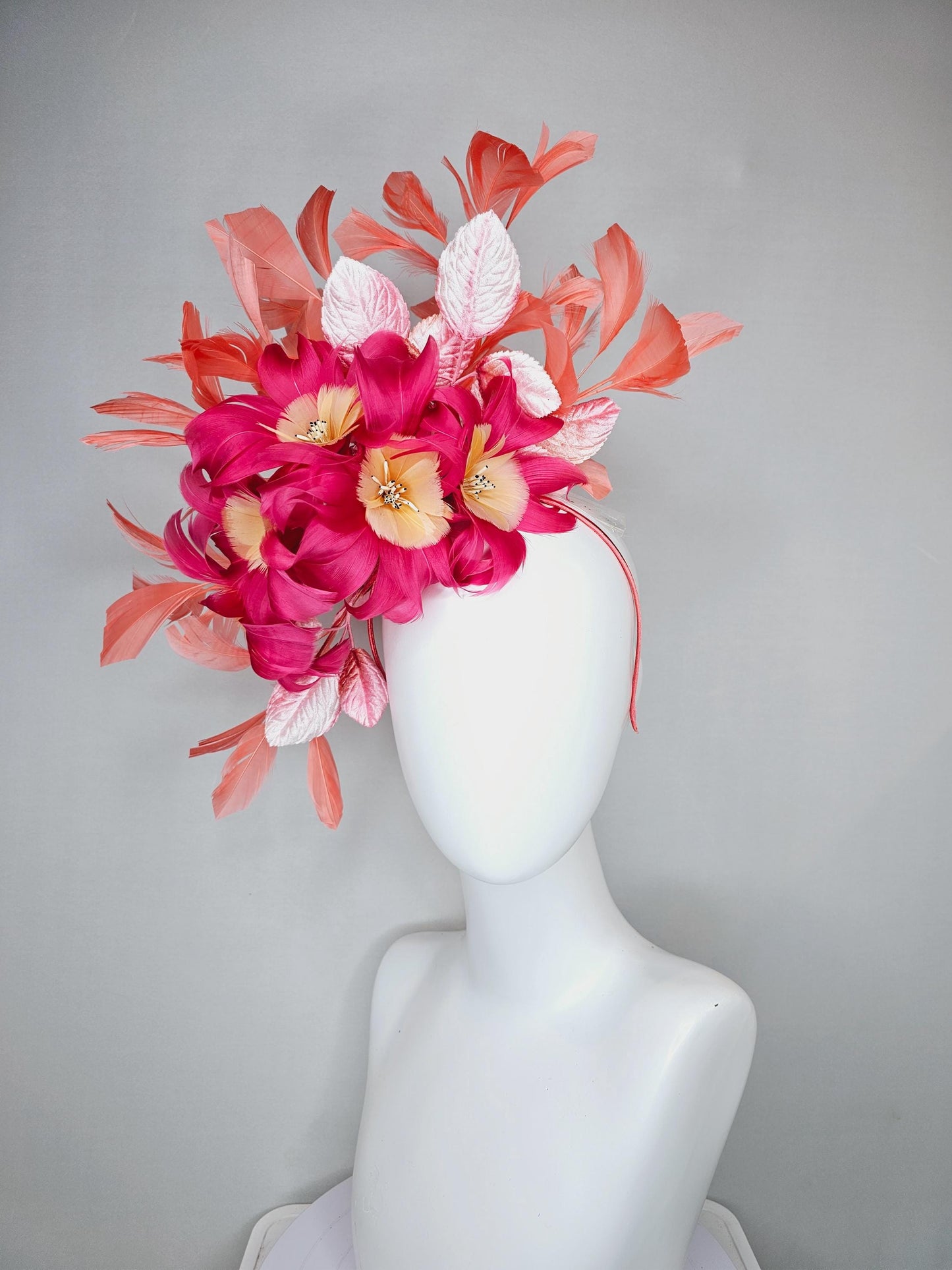 kentucky derby hat fascinator pink feather flowers with light blush pink leaves and coral orange feathers, thin headband