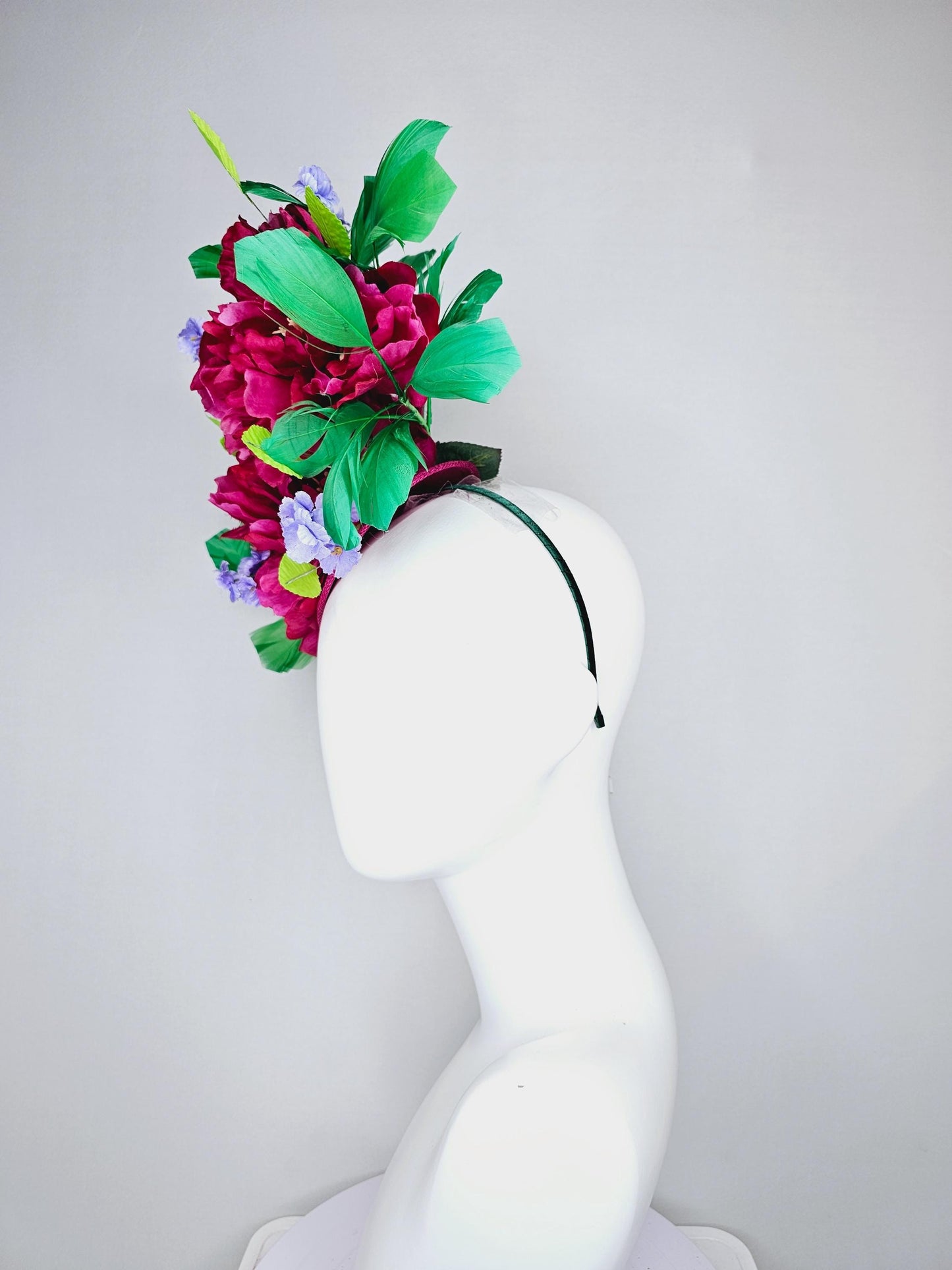 kentucky derby hat fascinator pink sinamay with pink fuchsia satin silk flowers, small light purple flowers,lime green leaves,green feathers