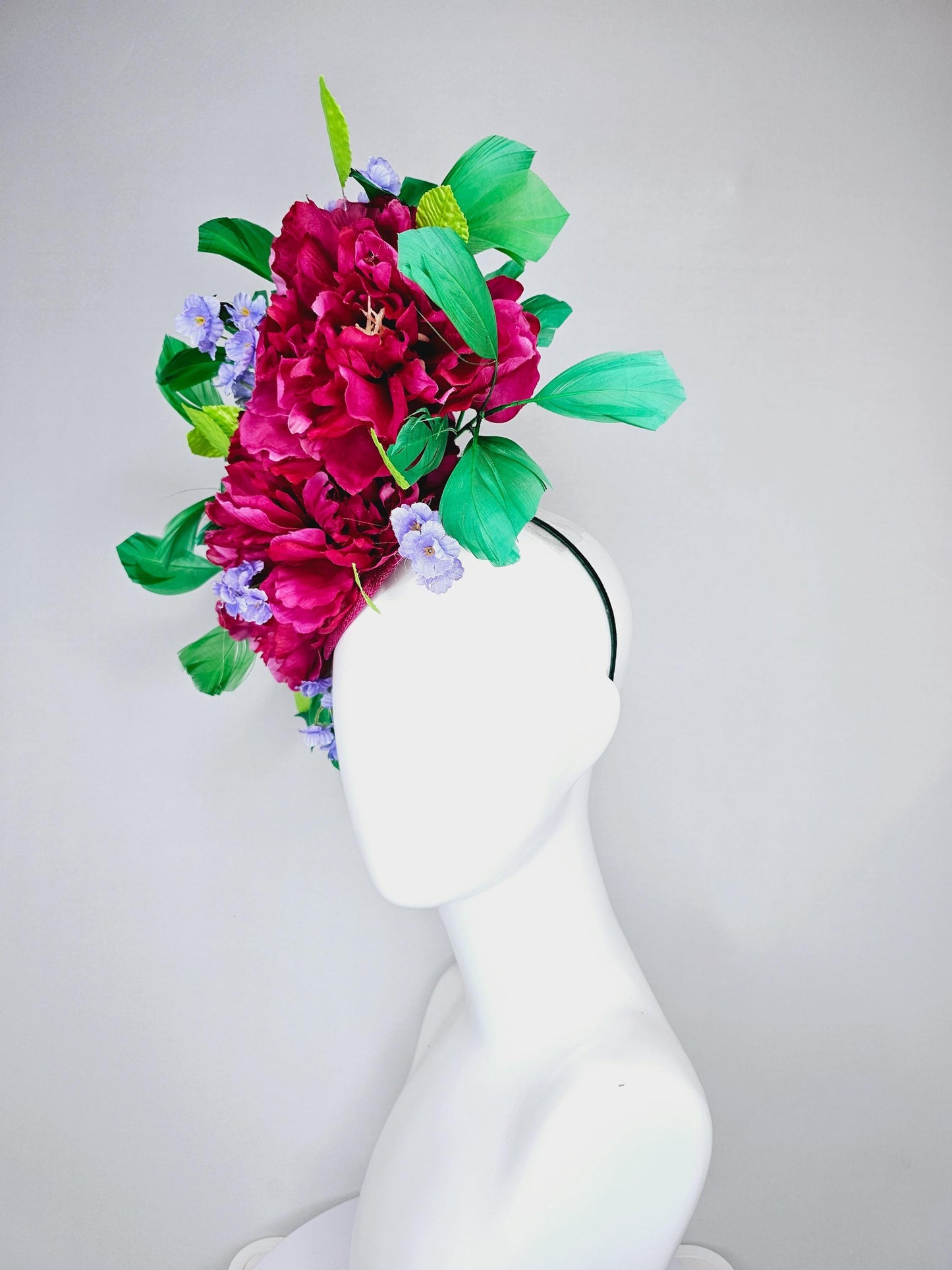 kentucky derby hat fascinator pink sinamay with pink fuchsia satin silk flowers, small light purple flowers,lime green leaves,green feathers