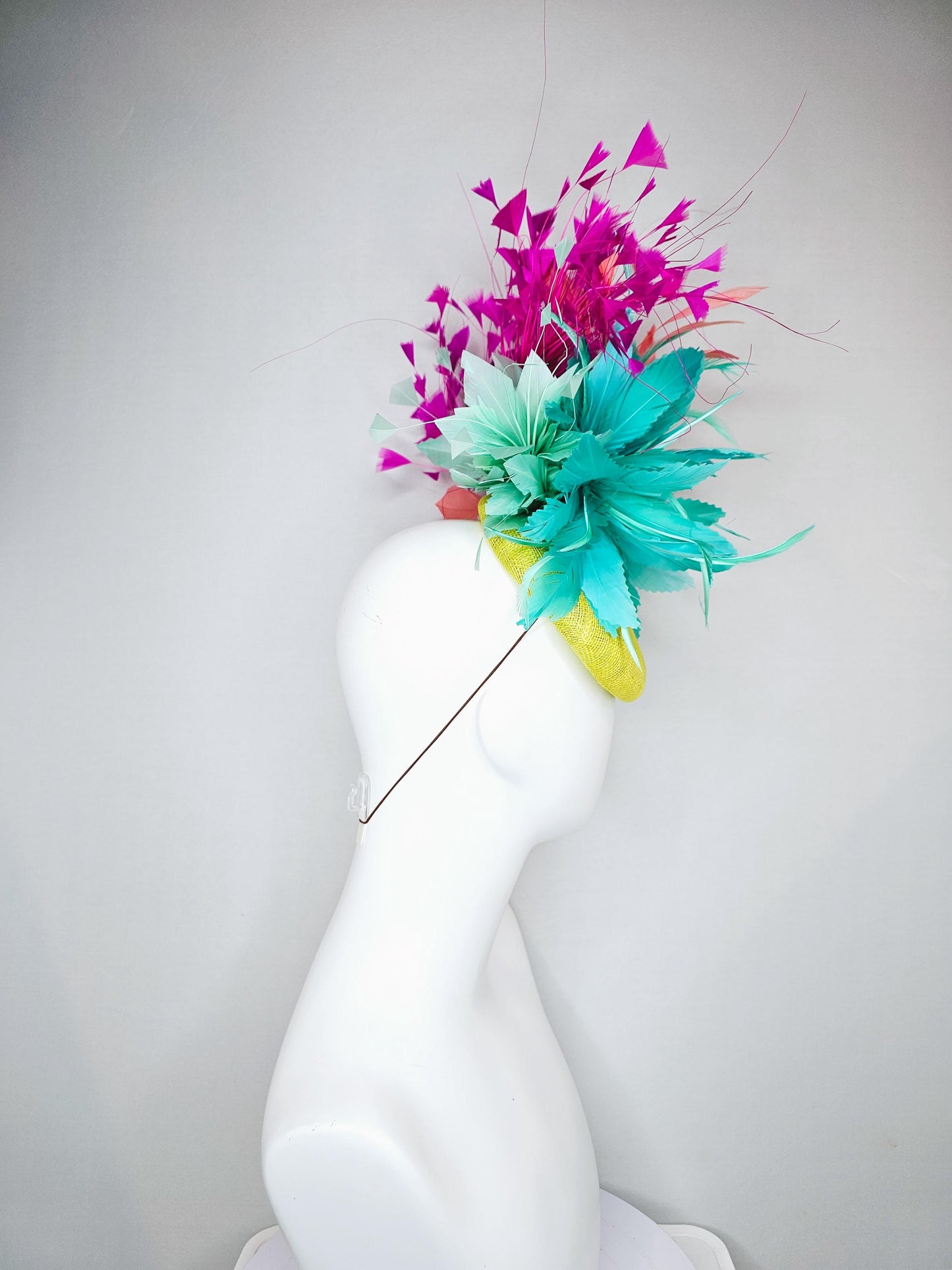 kentucky derby hat fascinator yellow sinamay with large fluffy aqua blue light orange coral feather flowers, bright pink branching feathers