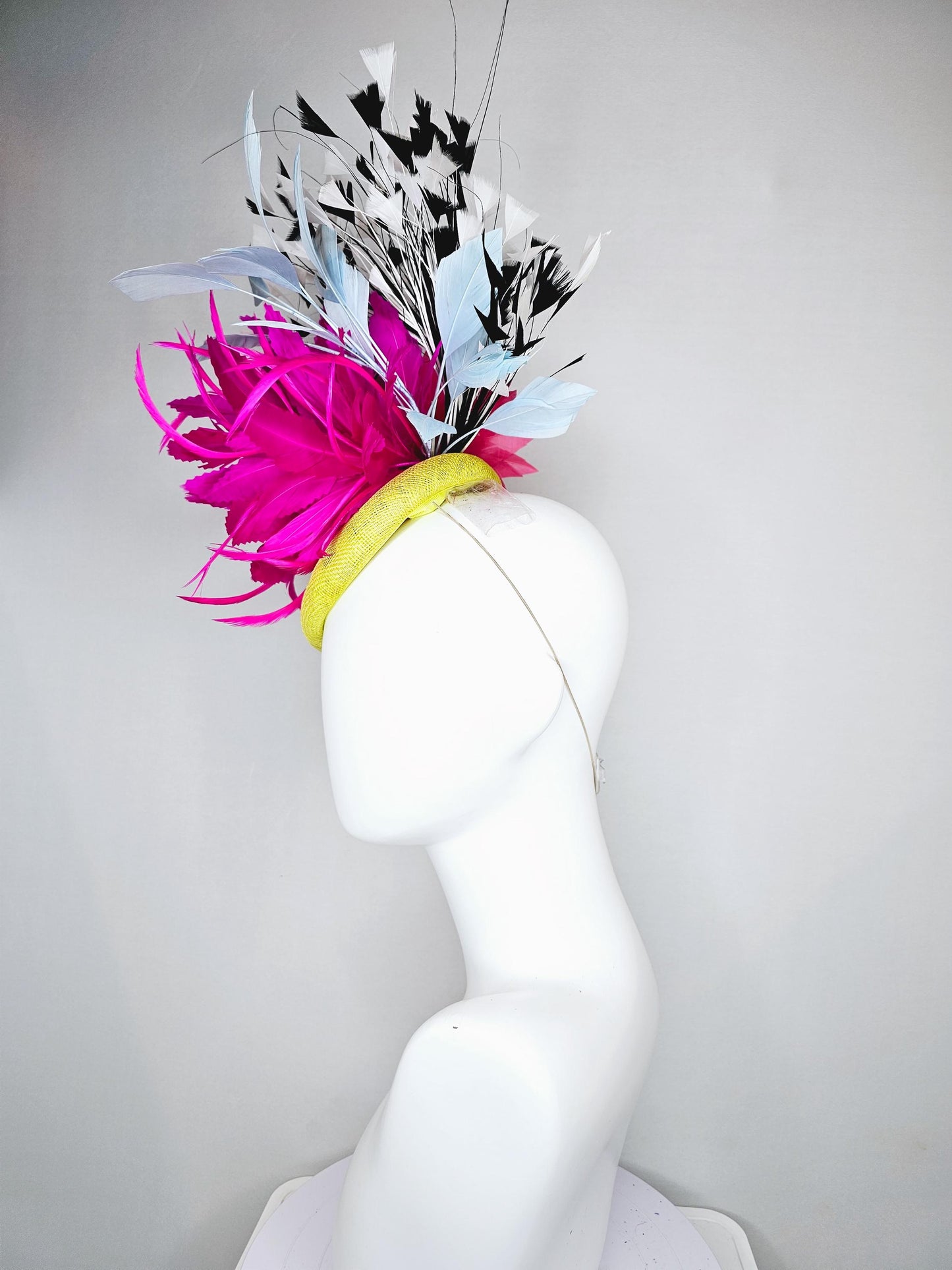 kentucky derby hat fascinator yellow sinamay with large fluffy fuchsia pink light blue feather flowers, black and white branching feathers