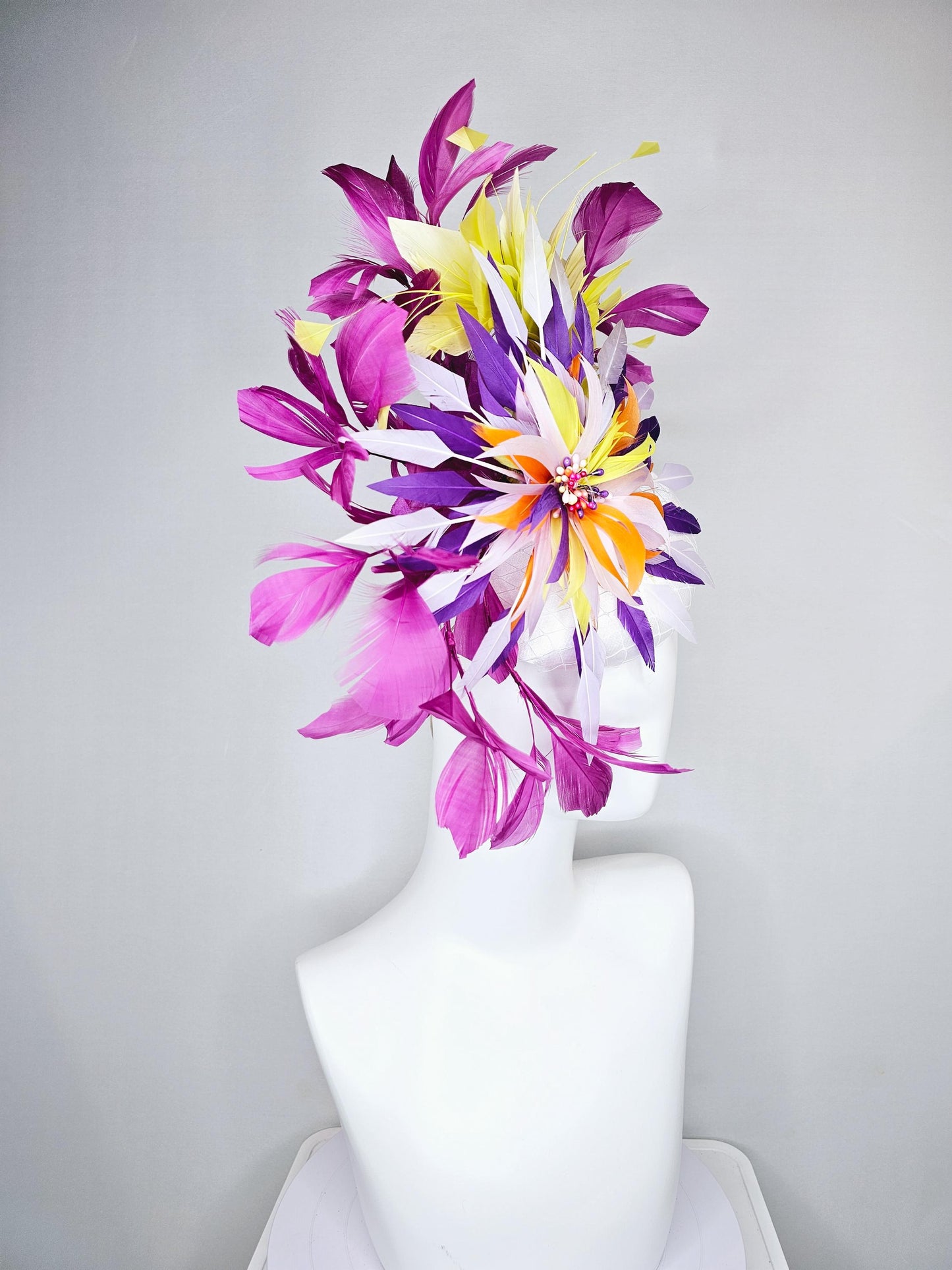 kentucky derby hat fascinator white satin with netting, orange yellow white purple feather flower, yellow purple magenta branching feathers