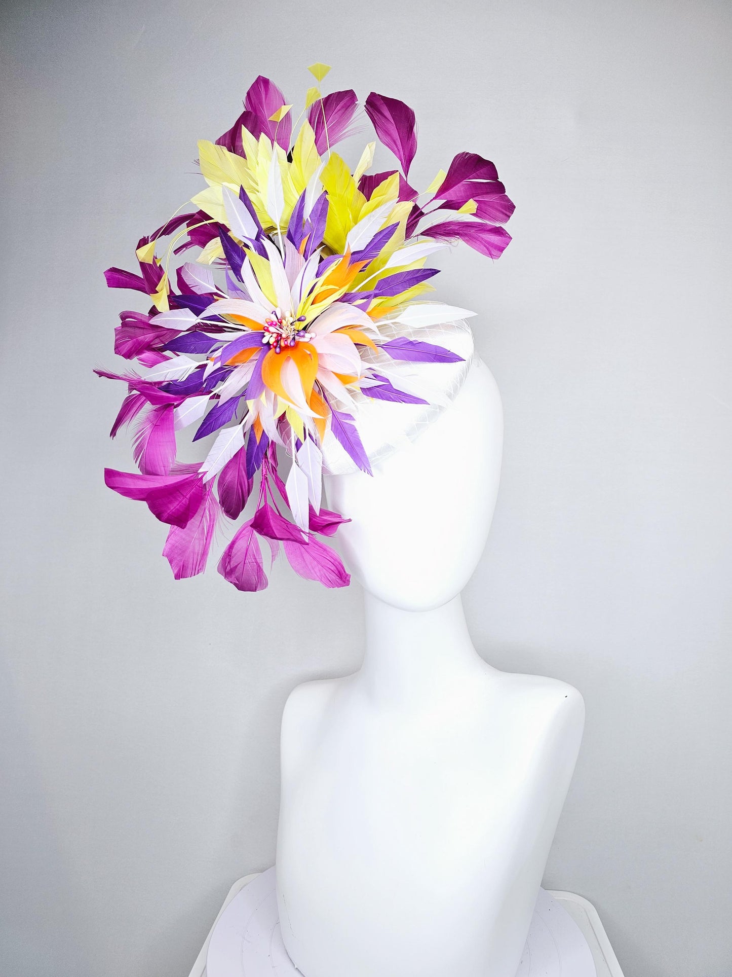 kentucky derby hat fascinator white satin with netting, orange yellow white purple feather flower, yellow purple magenta branching feathers