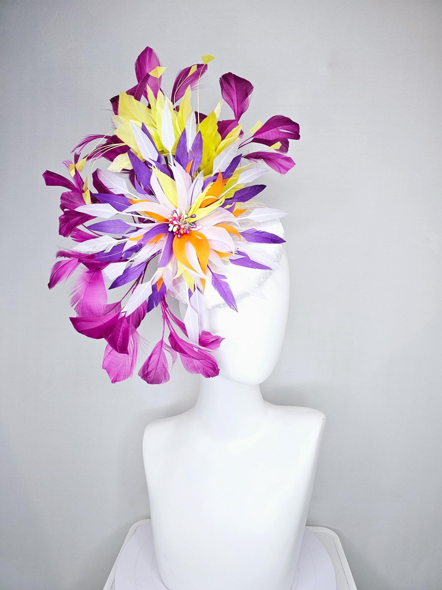 kentucky derby hat fascinator white satin with netting, orange yellow white purple feather flower, yellow purple magenta branching feathers