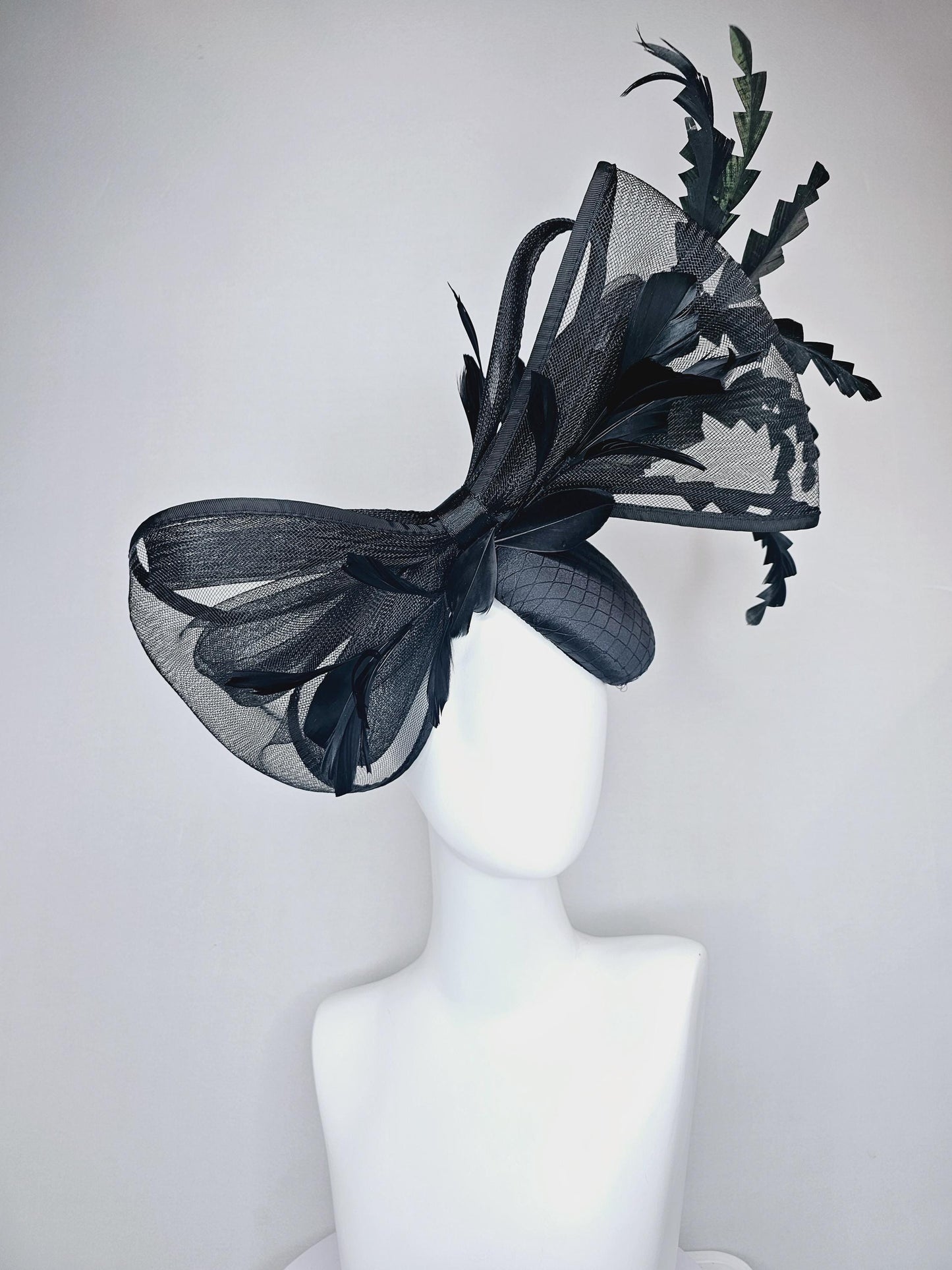 kentucky derby hat fascinator black satin with netting with large black mesh bow and black zigzag branching feathers