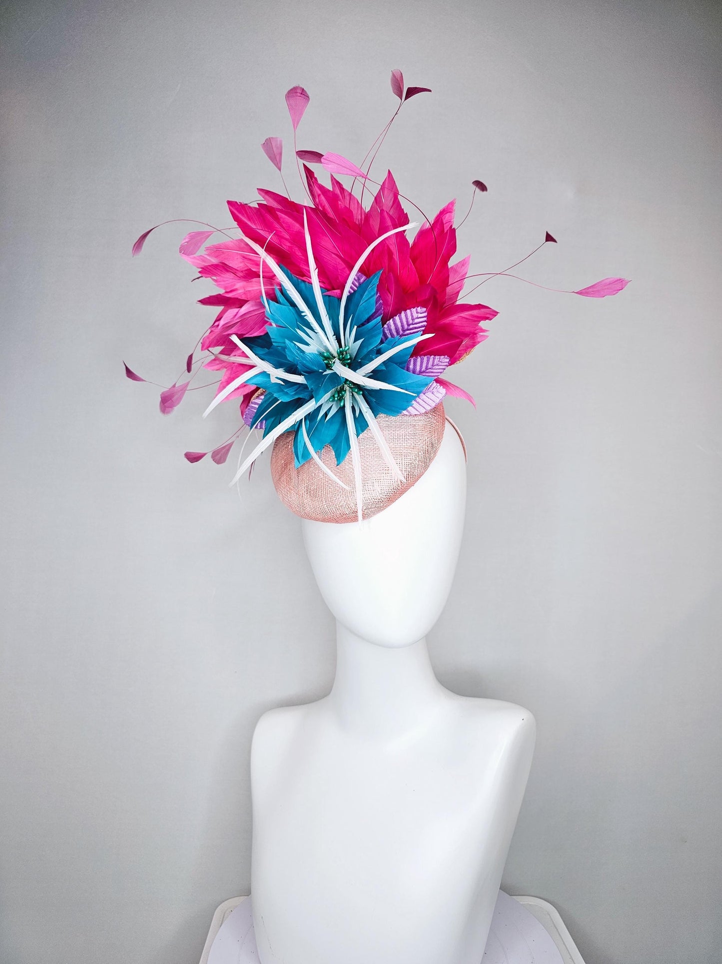 kentucky derby hat fascinator light pink sinamay with royal blue feather flower with fuchsia hot pink feathers and purple velvet leaves