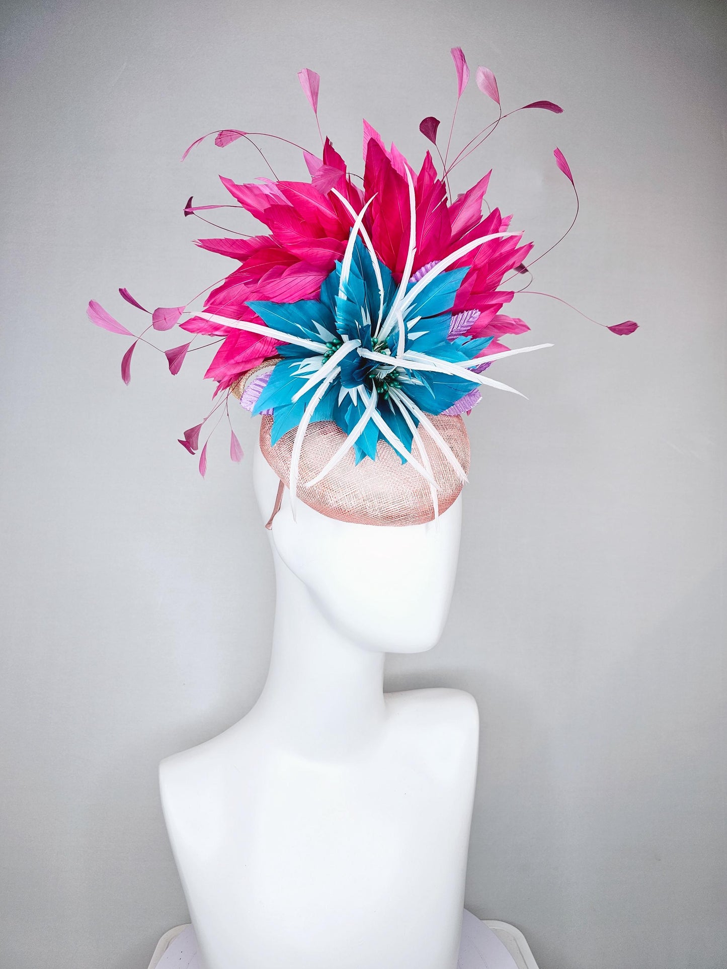 kentucky derby hat fascinator light pink sinamay with royal blue feather flower with fuchsia hot pink feathers and purple velvet leaves